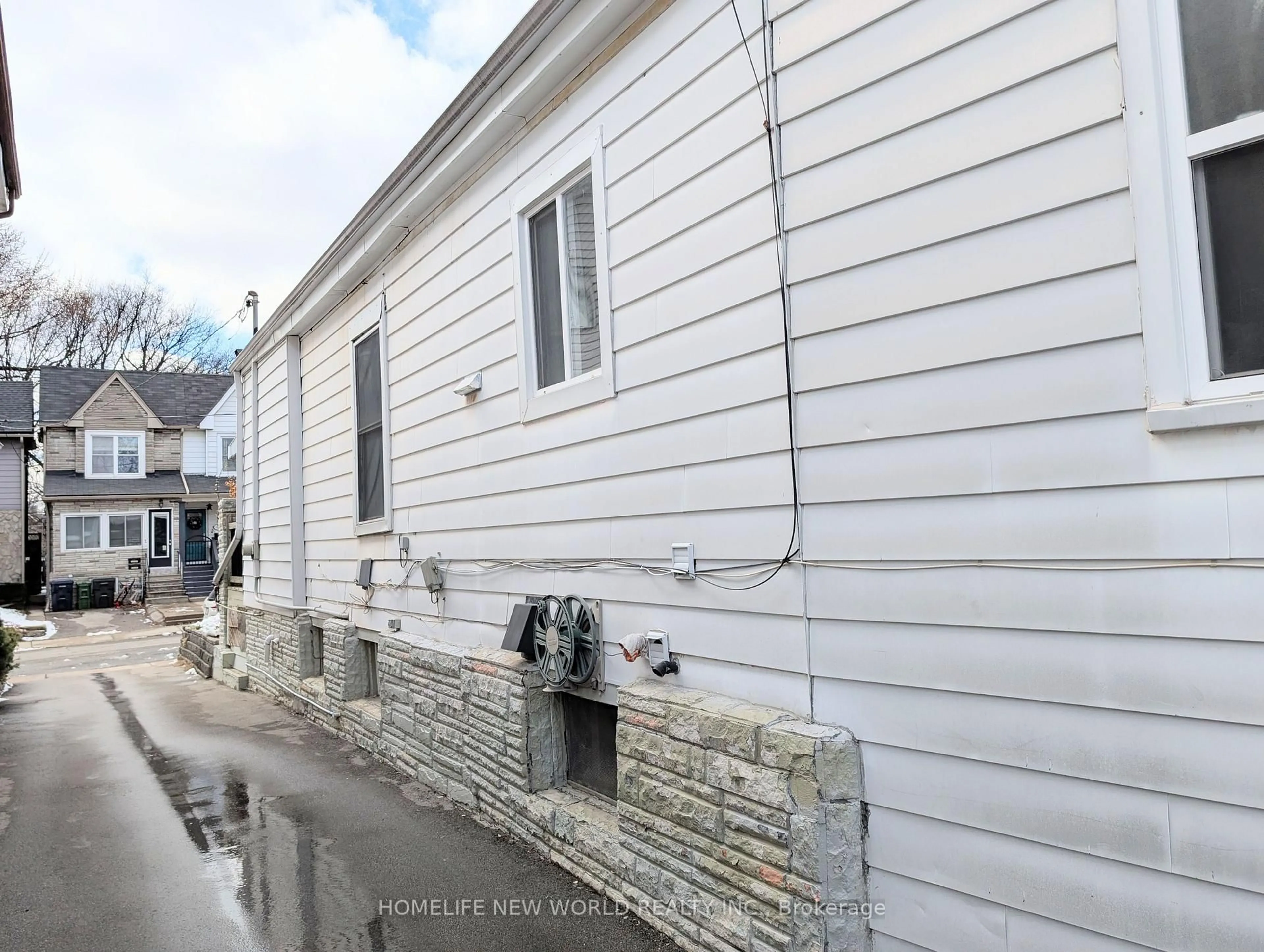 Home with vinyl exterior material, street for 67 Condor Ave, Toronto Ontario M4J 3M7
