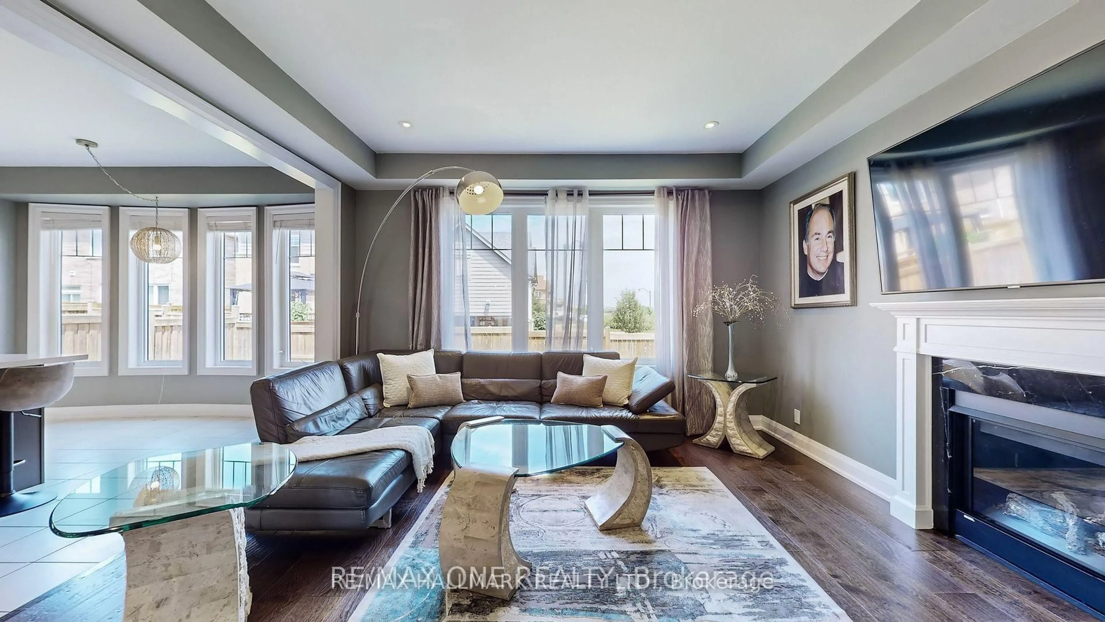 Living room with furniture, wood/laminate floor for 270 Symington Ave, Oshawa Ontario L1L 0J9