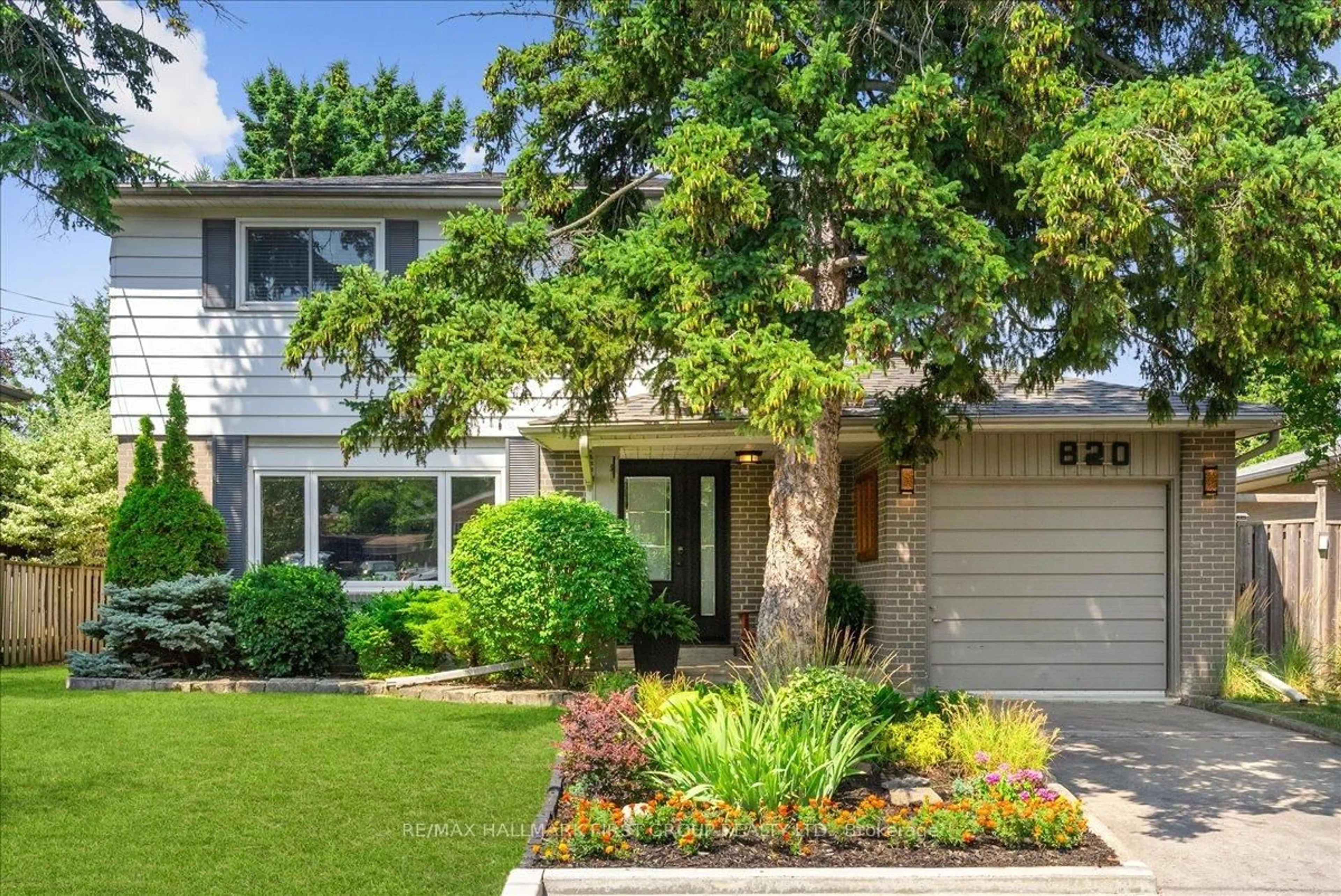 Home with vinyl exterior material, street for 820 Sanok Dr, Pickering Ontario L1W 2R2