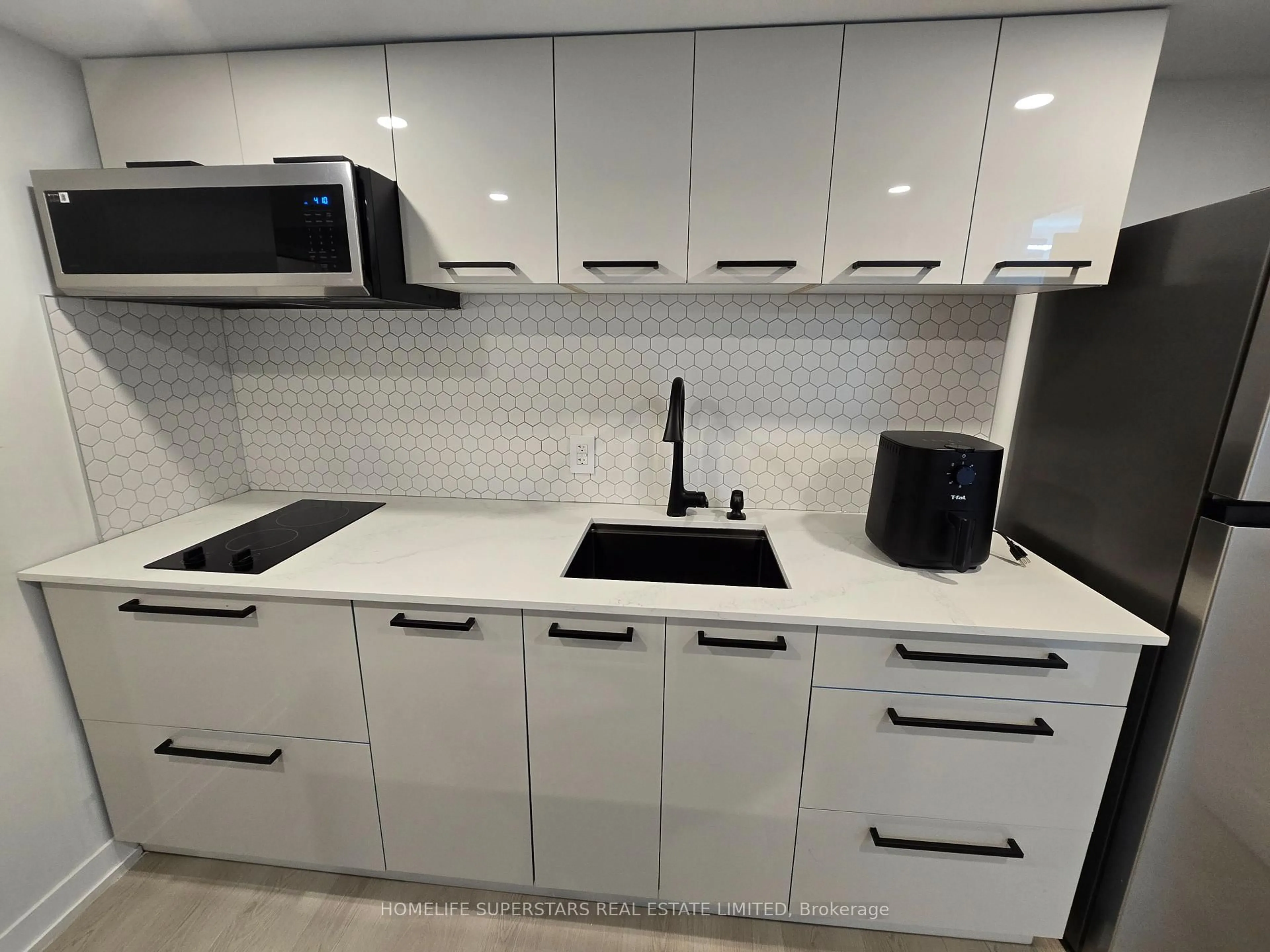 Standard kitchen, ceramic/tile floor for 40 Akil Thomas Gdns, Toronto Ontario M1P 0G3