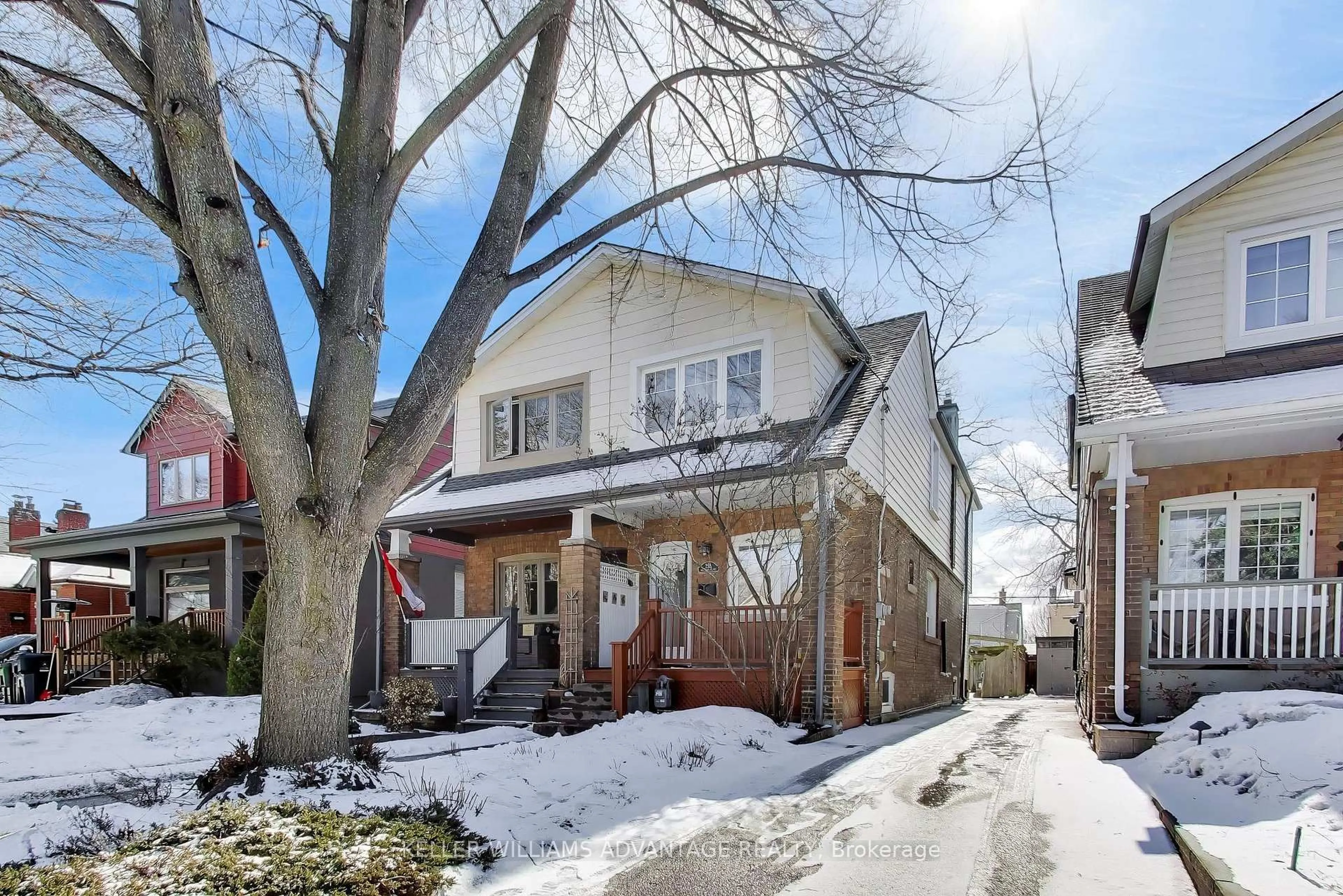 Home with brick exterior material, street for 255 Queensdale Ave, Toronto Ontario M4C 2B3