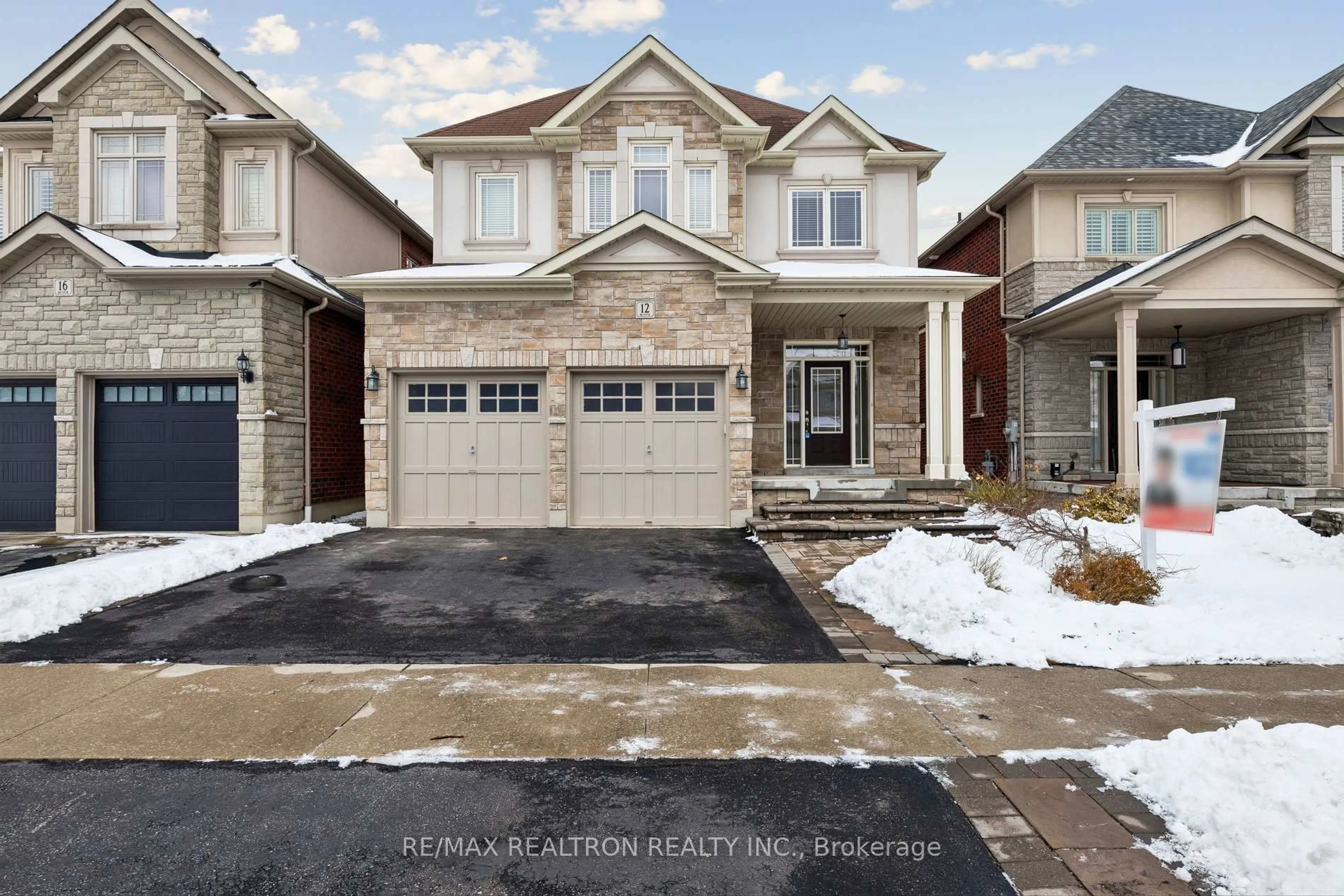 Home with brick exterior material, street for 12 Promenade Dr, Whitby Ontario L1R 0L4