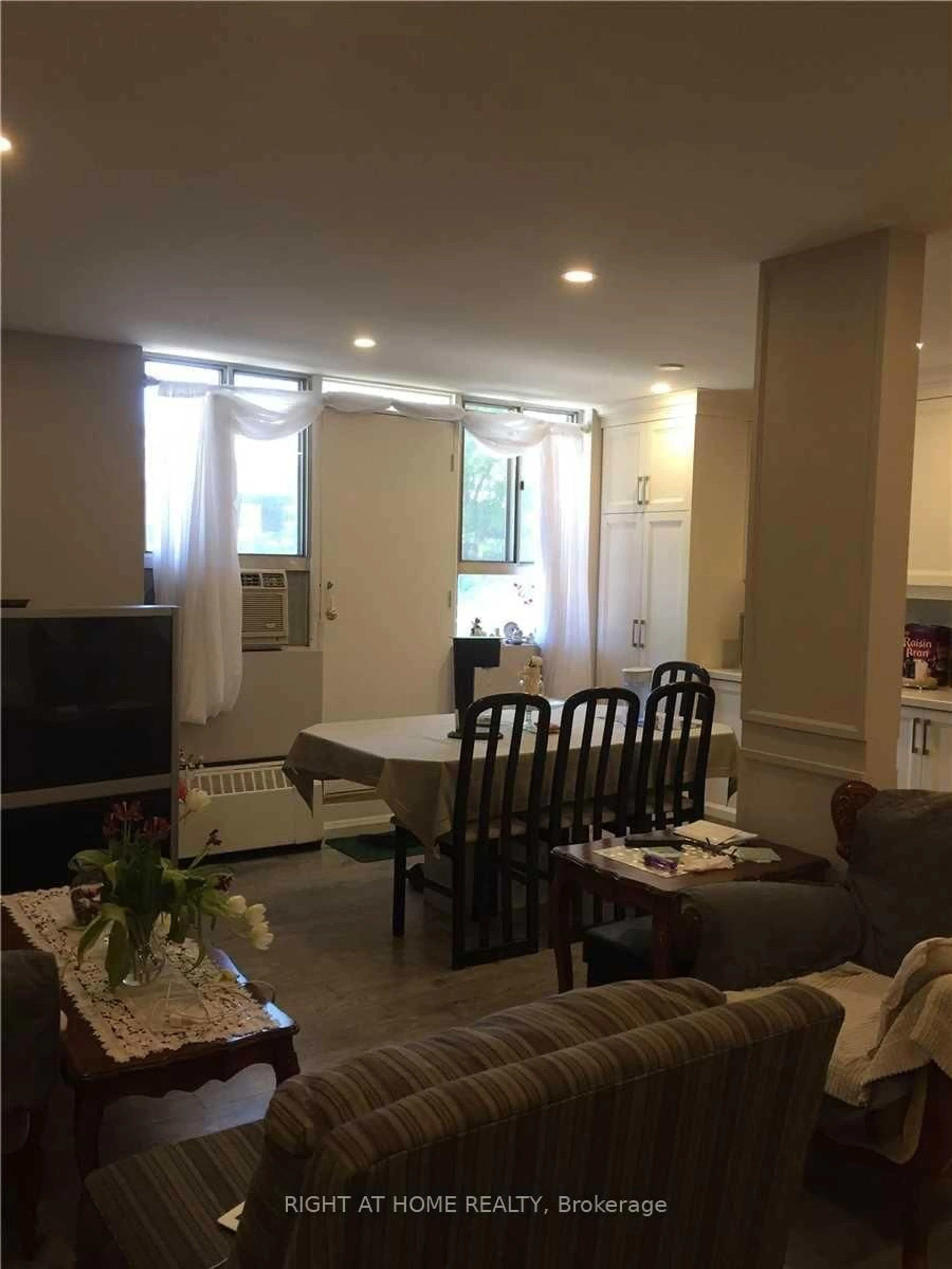 Living room with furniture, unknown for 100 Dundalk Dr #208, Toronto Ontario M1P 4V2