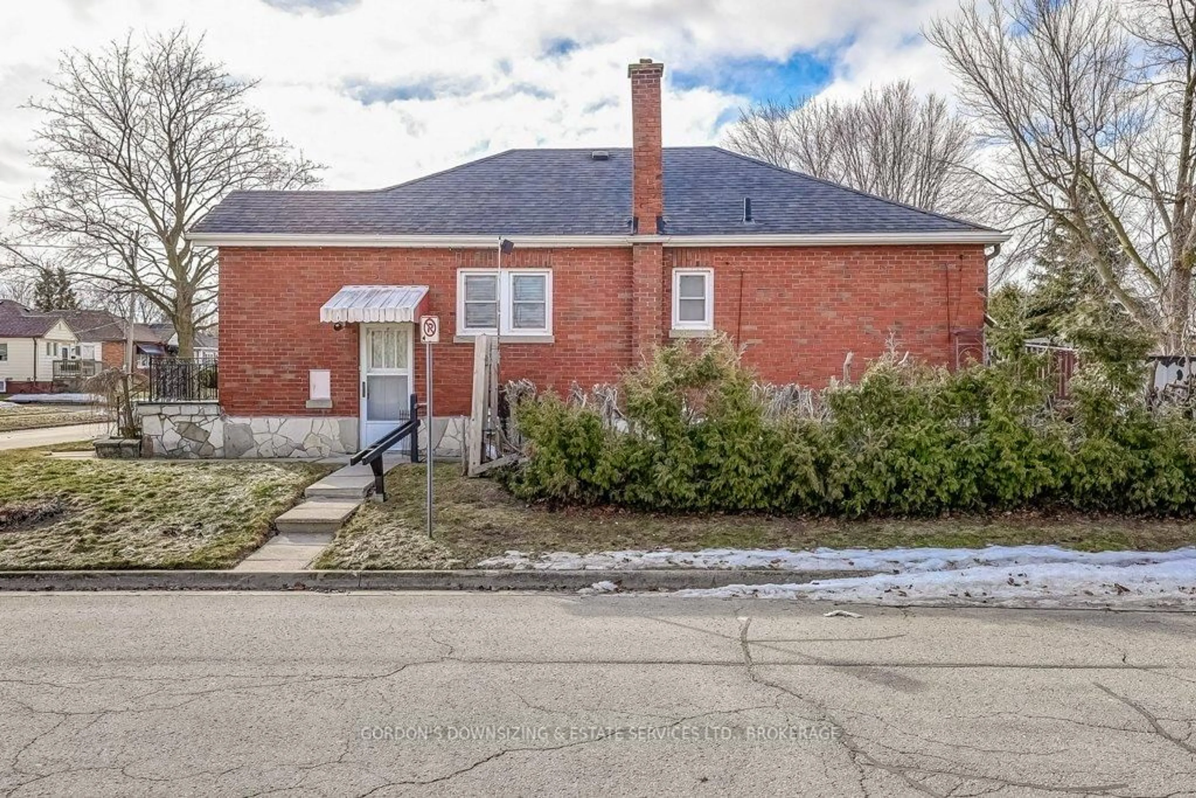 Home with brick exterior material, street for 402 Division St, Oshawa Ontario L1G 5M9