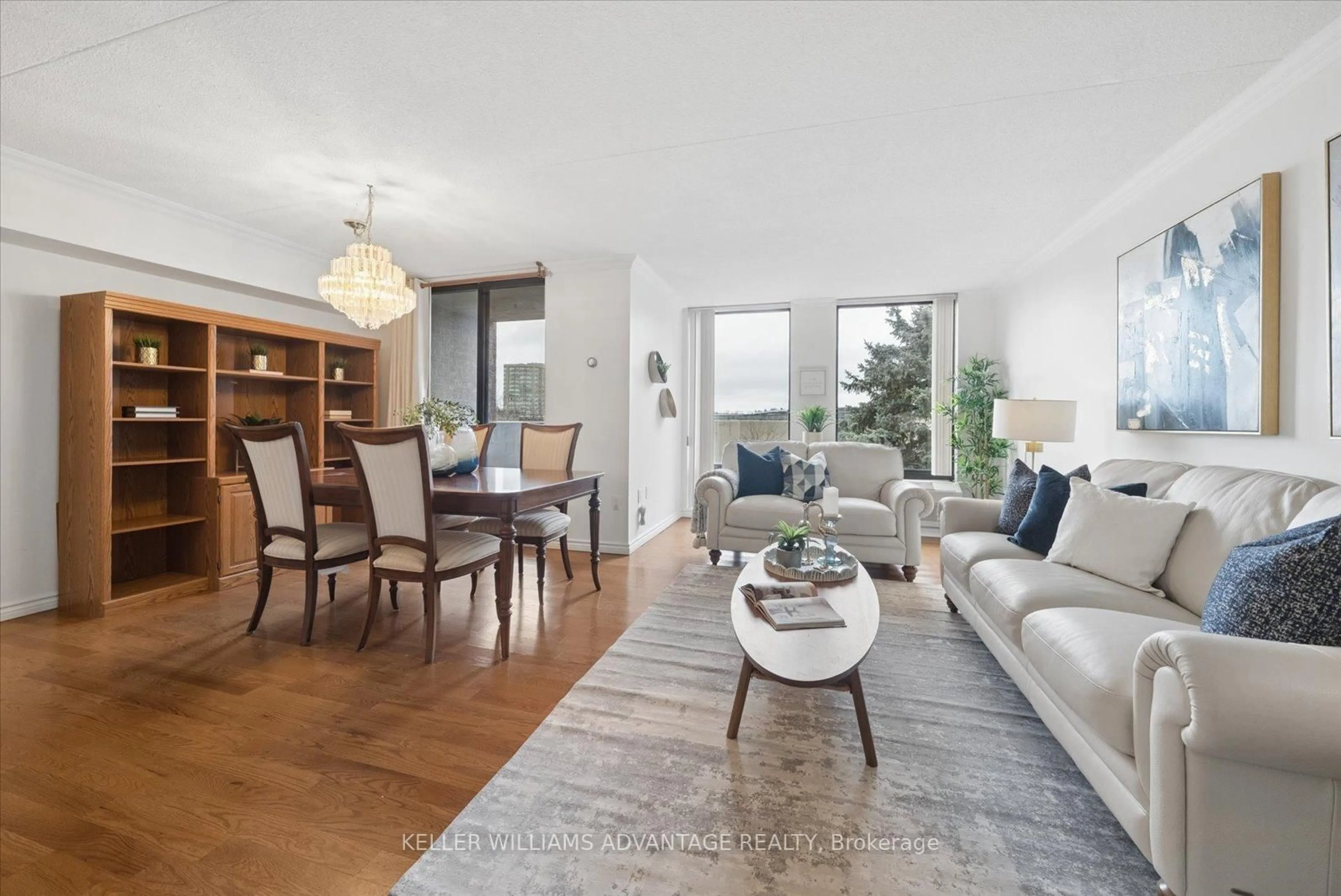 Living room with furniture, wood/laminate floor for 1525 Diefenbaker Crt #408, Pickering Ontario L1V 3W1