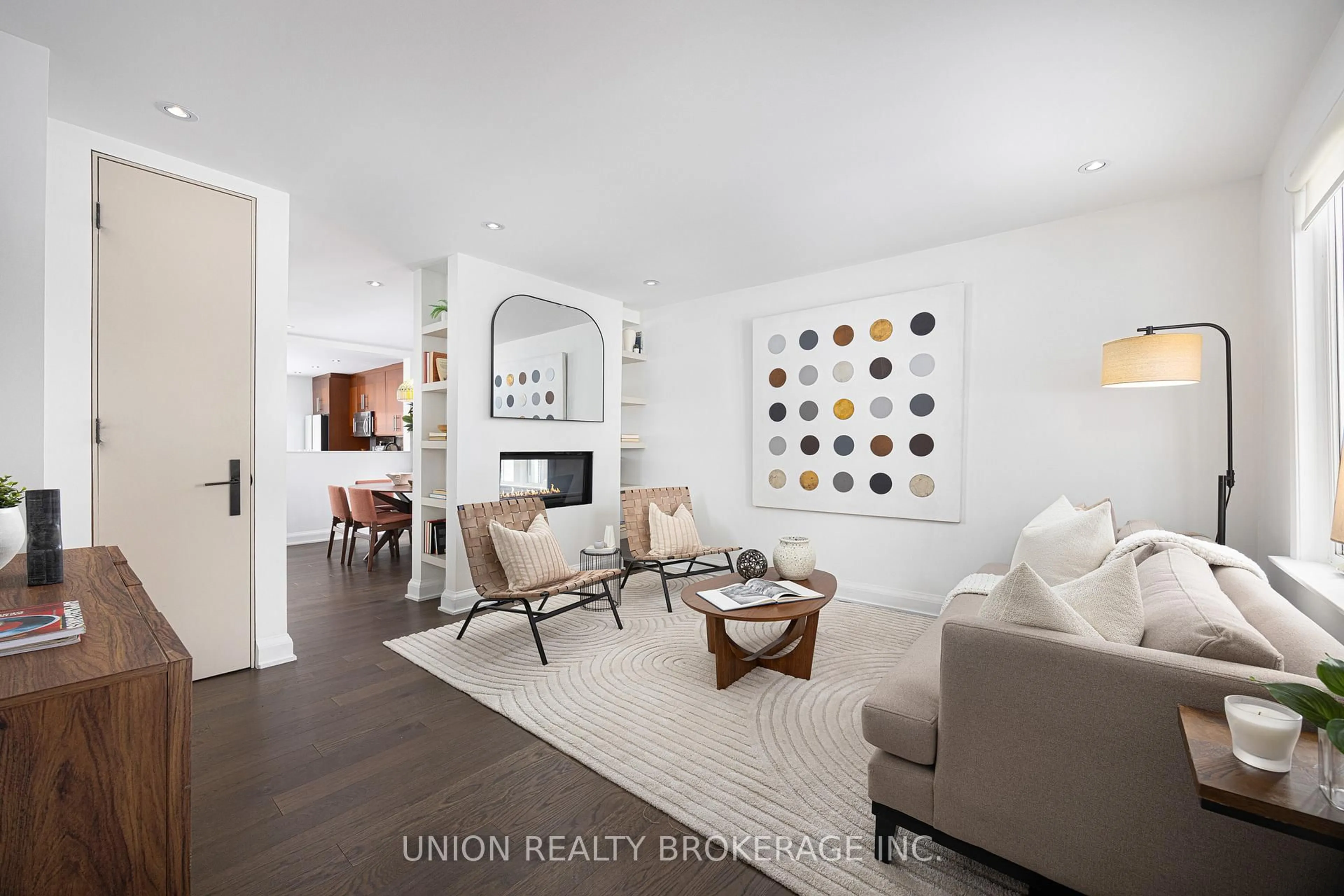 Living room with furniture, wood/laminate floor for 246 Lee Ave, Toronto Ontario M4E 2P5