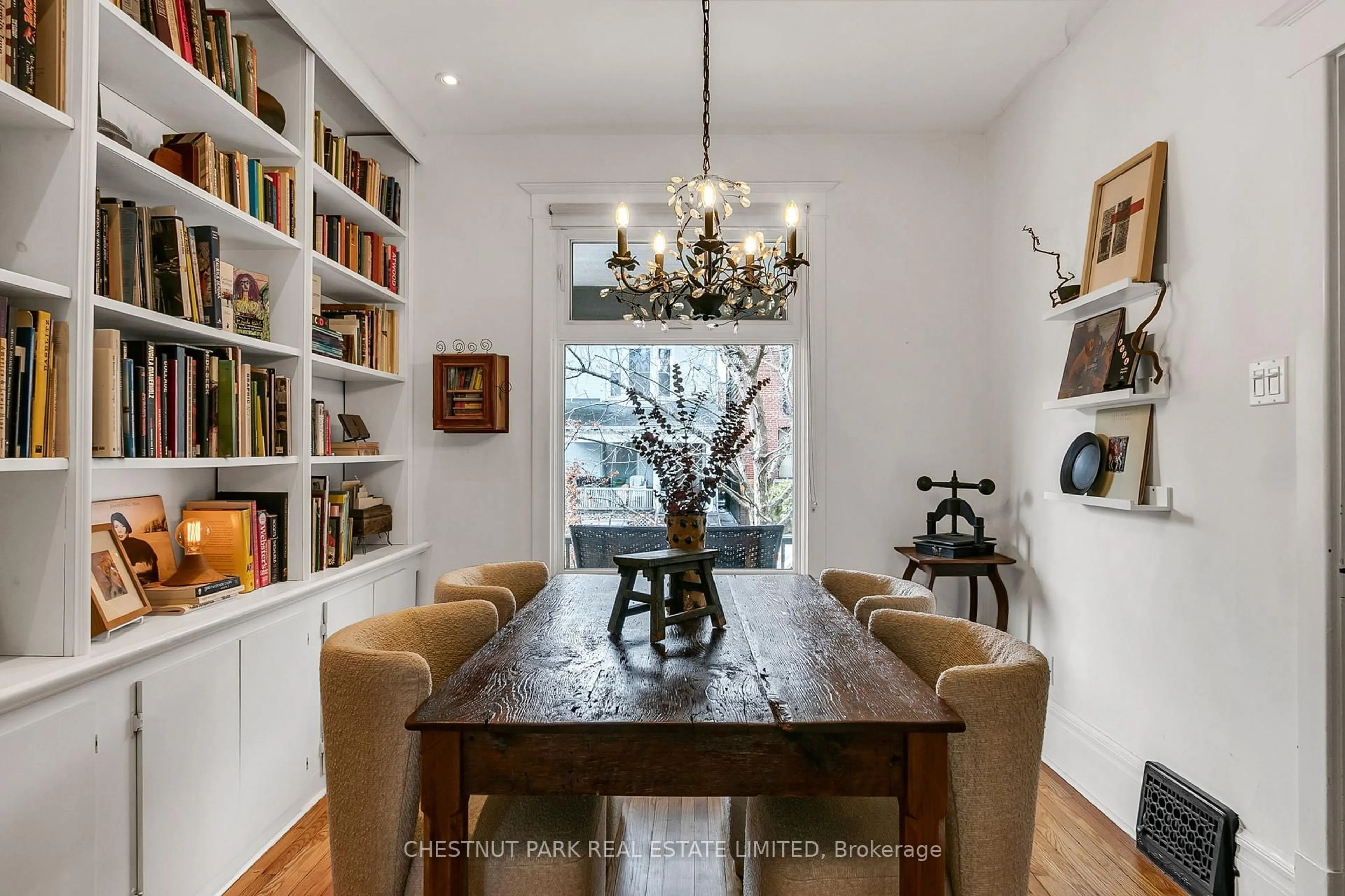 Dining room, wood/laminate floor for 73 Tiverton Ave, Toronto Ontario M4M 2M1