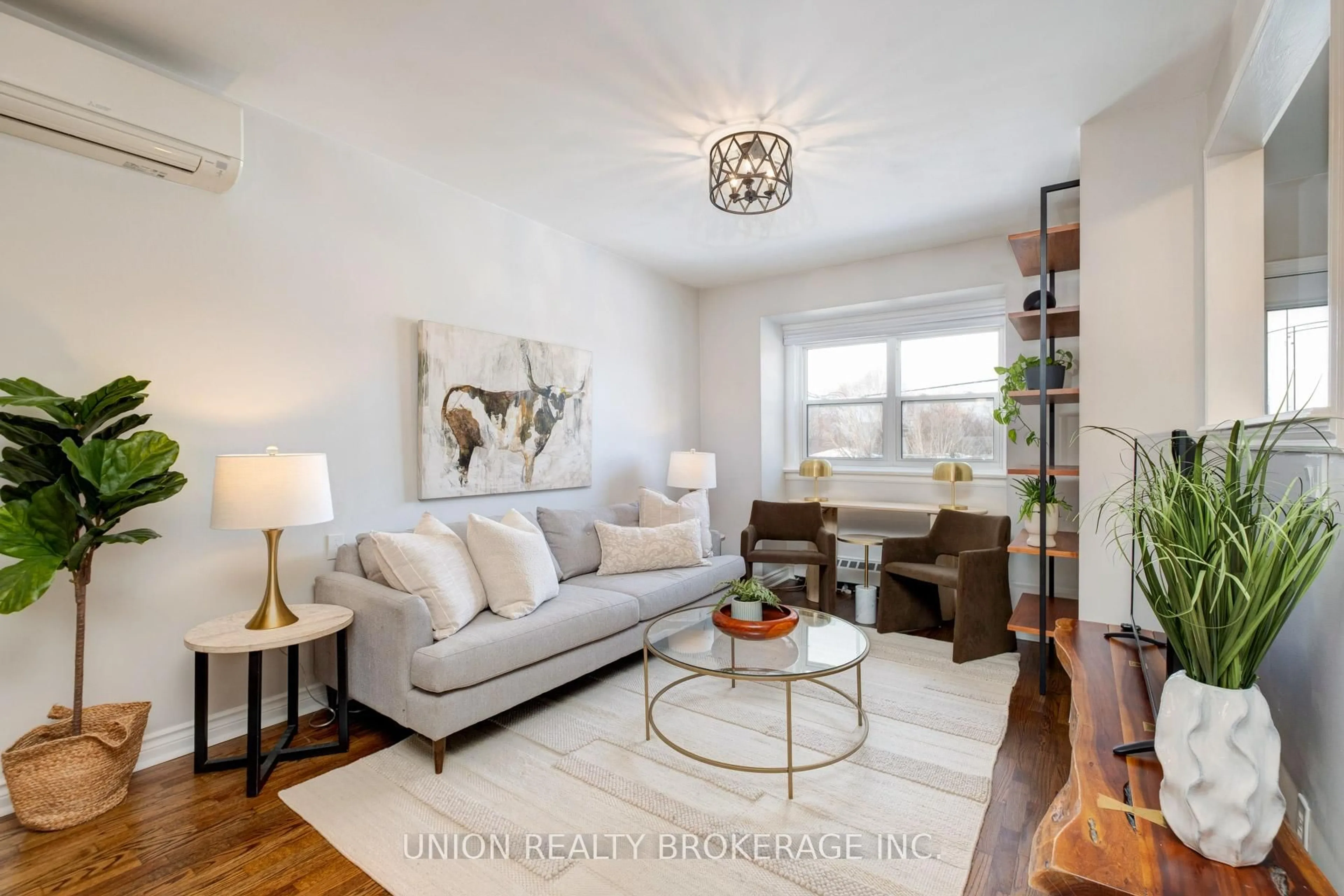 Living room with furniture, wood/laminate floor for 69 Maybourne Ave, Toronto Ontario M1L 2W1