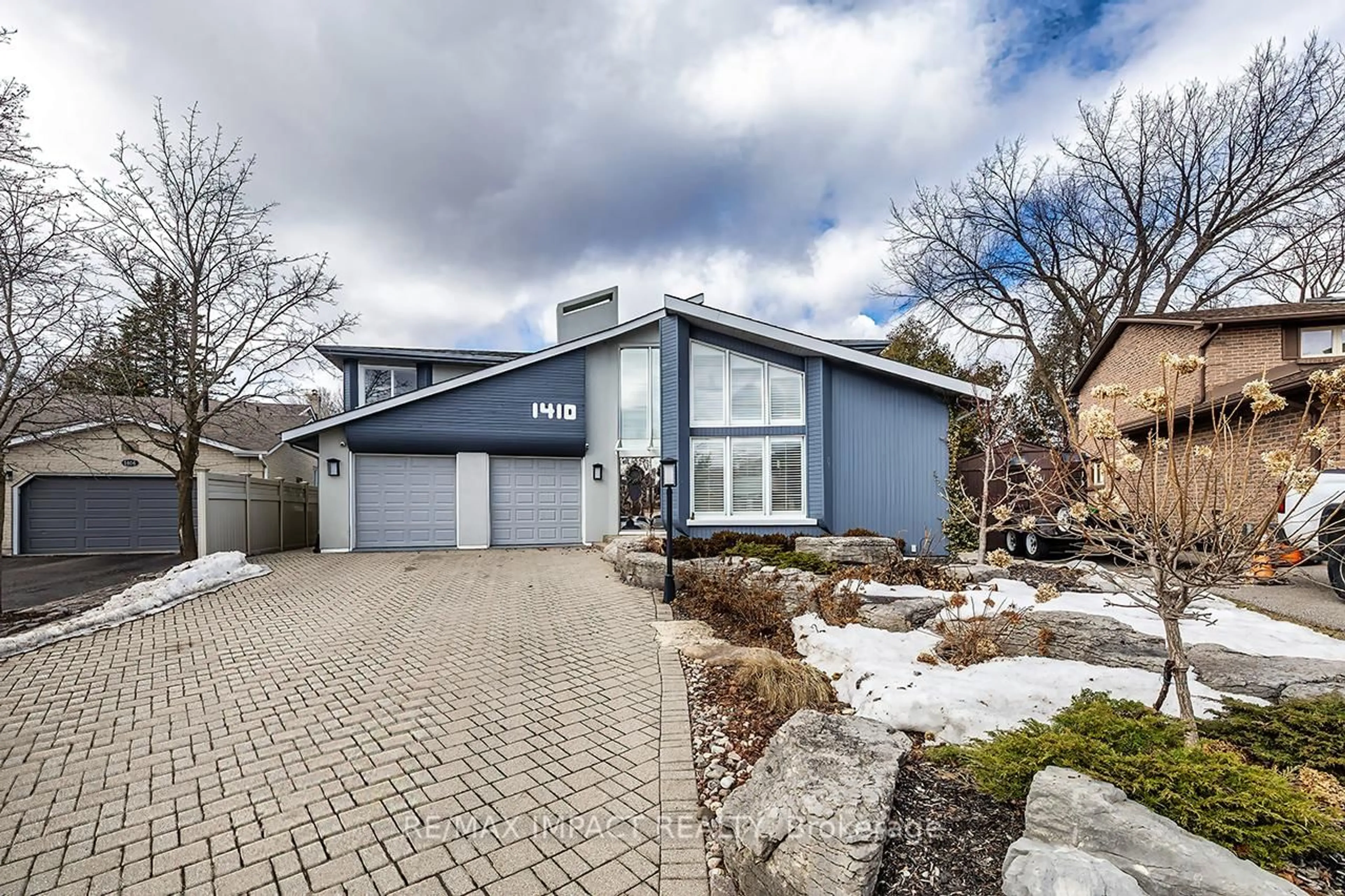 Home with brick exterior material, street for 1410 Manitou Dr, Oshawa Ontario L1G 7P7