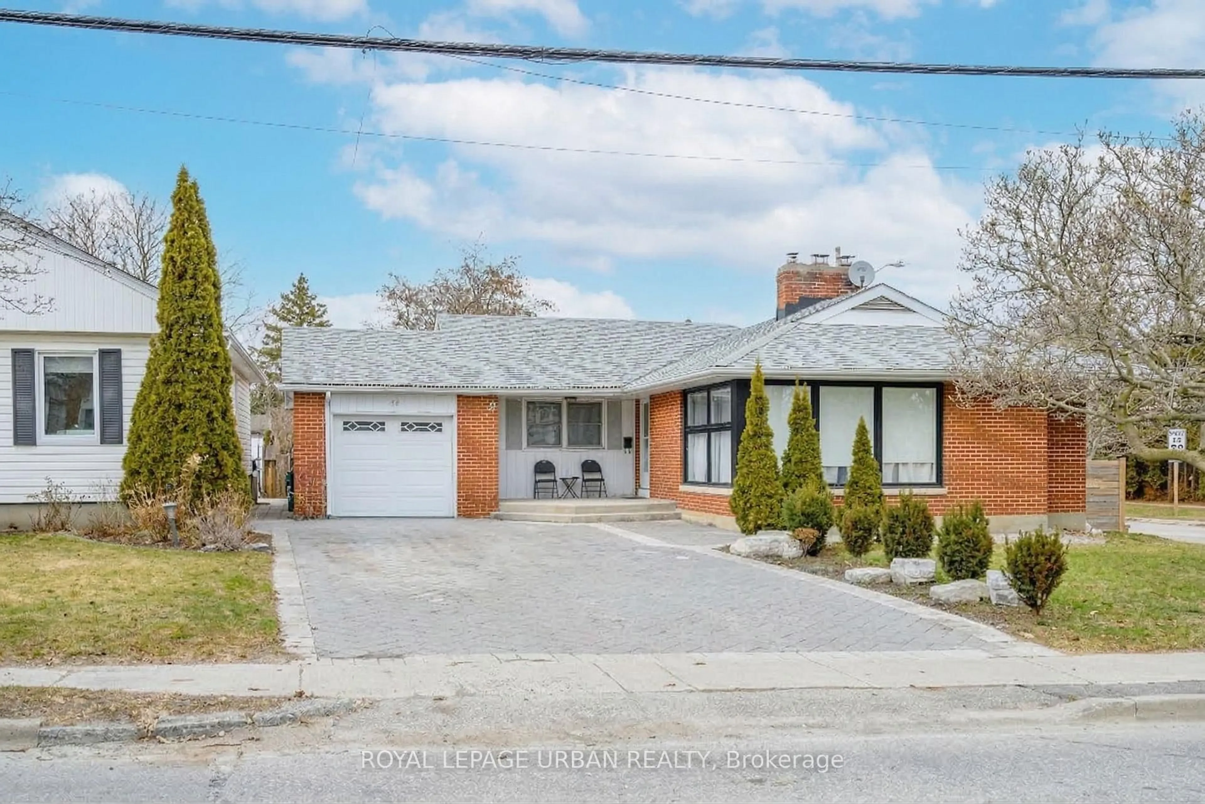 Home with brick exterior material, street for 92 Rossland Rd, Oshawa Ontario L1G 2W3