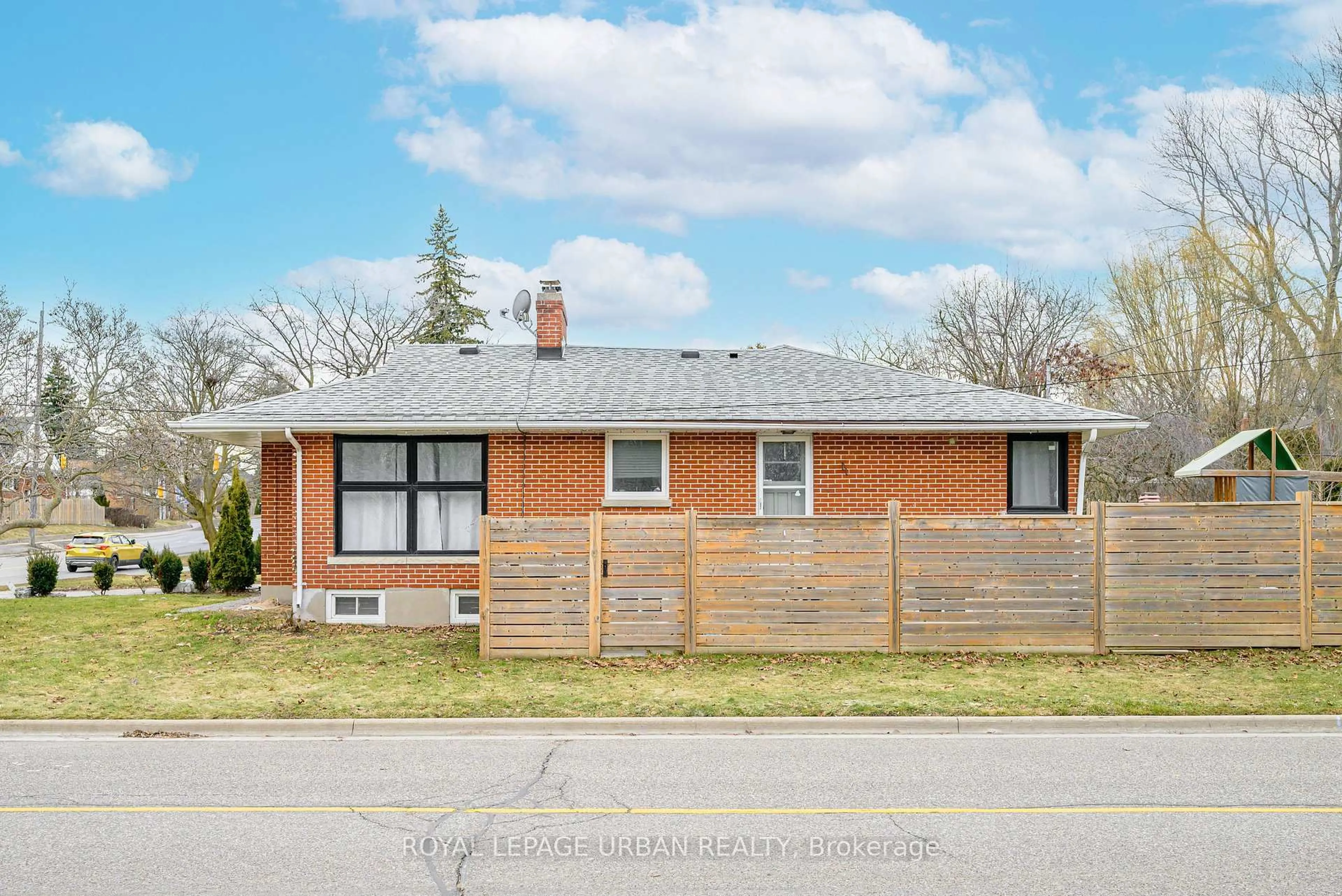 Home with brick exterior material, street for 92 Rossland Rd, Oshawa Ontario L1G 2W3