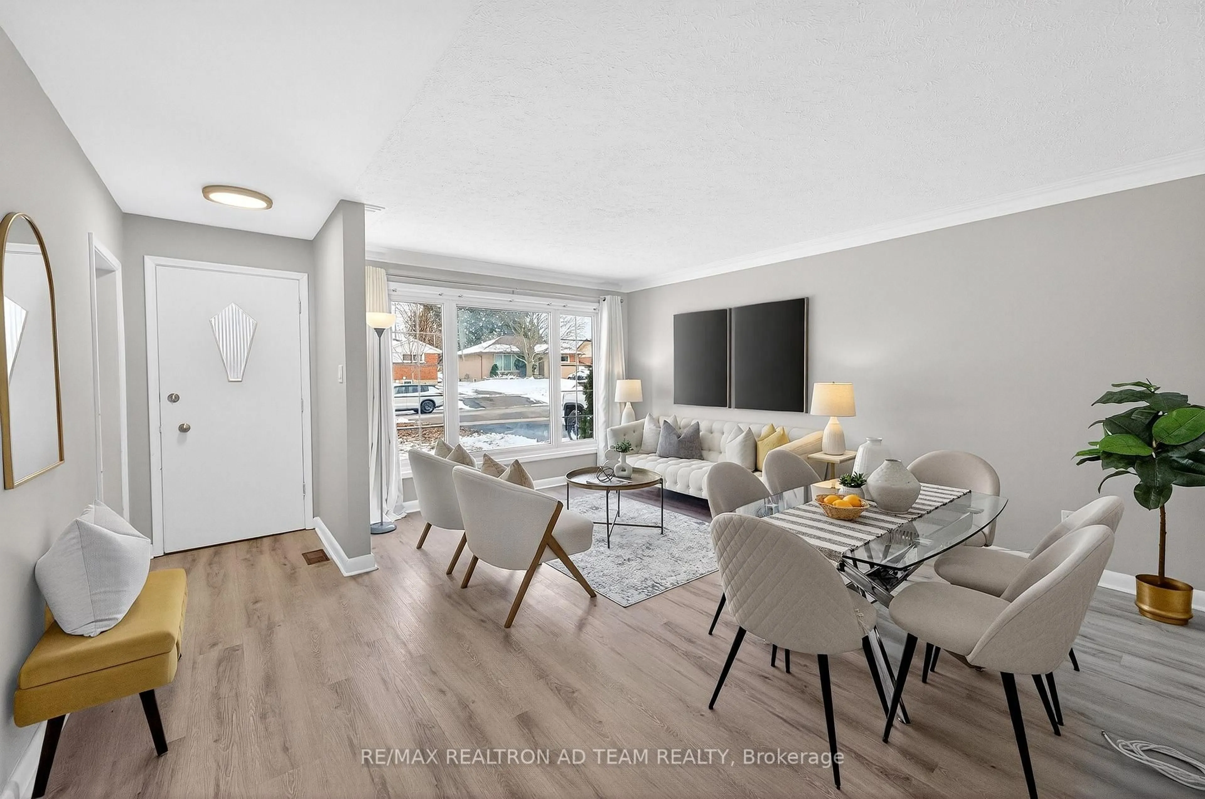 Living room with furniture, wood/laminate floor for 384 Elizabeth St, Oshawa Ontario L1J 5S8