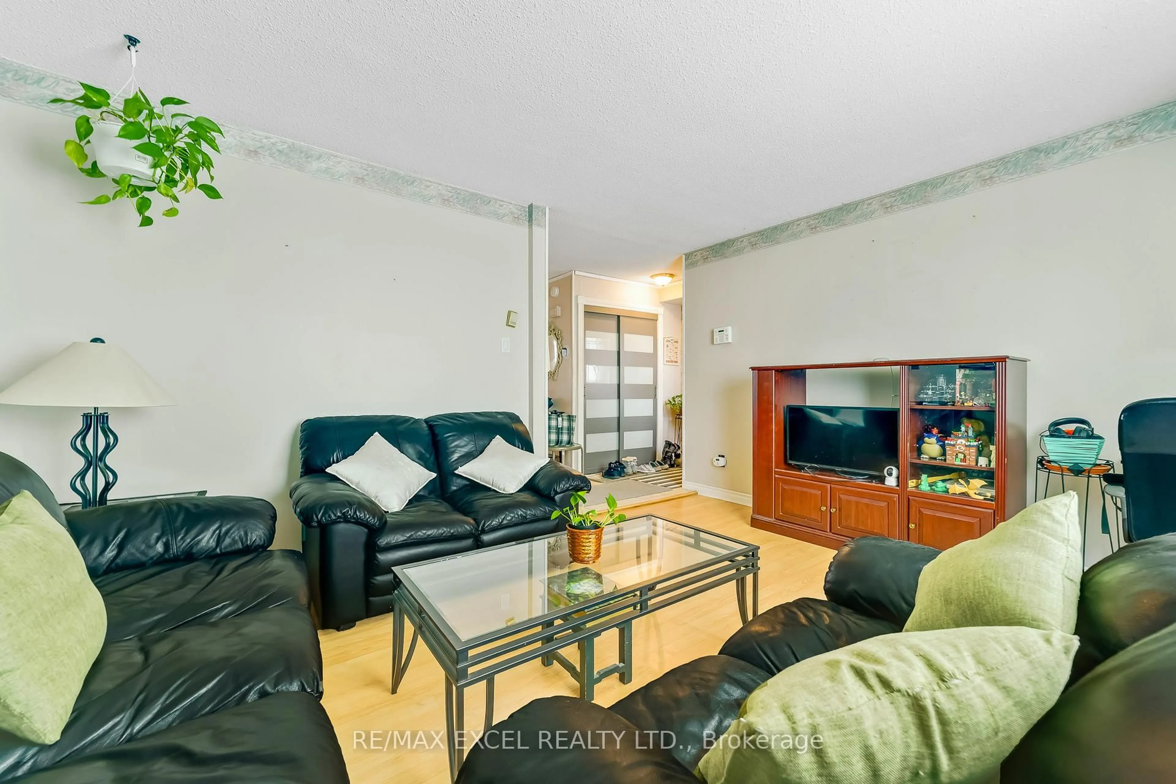 Living room with furniture, unknown for 93 Bradstone Sq, Toronto Ontario M1B 1W1