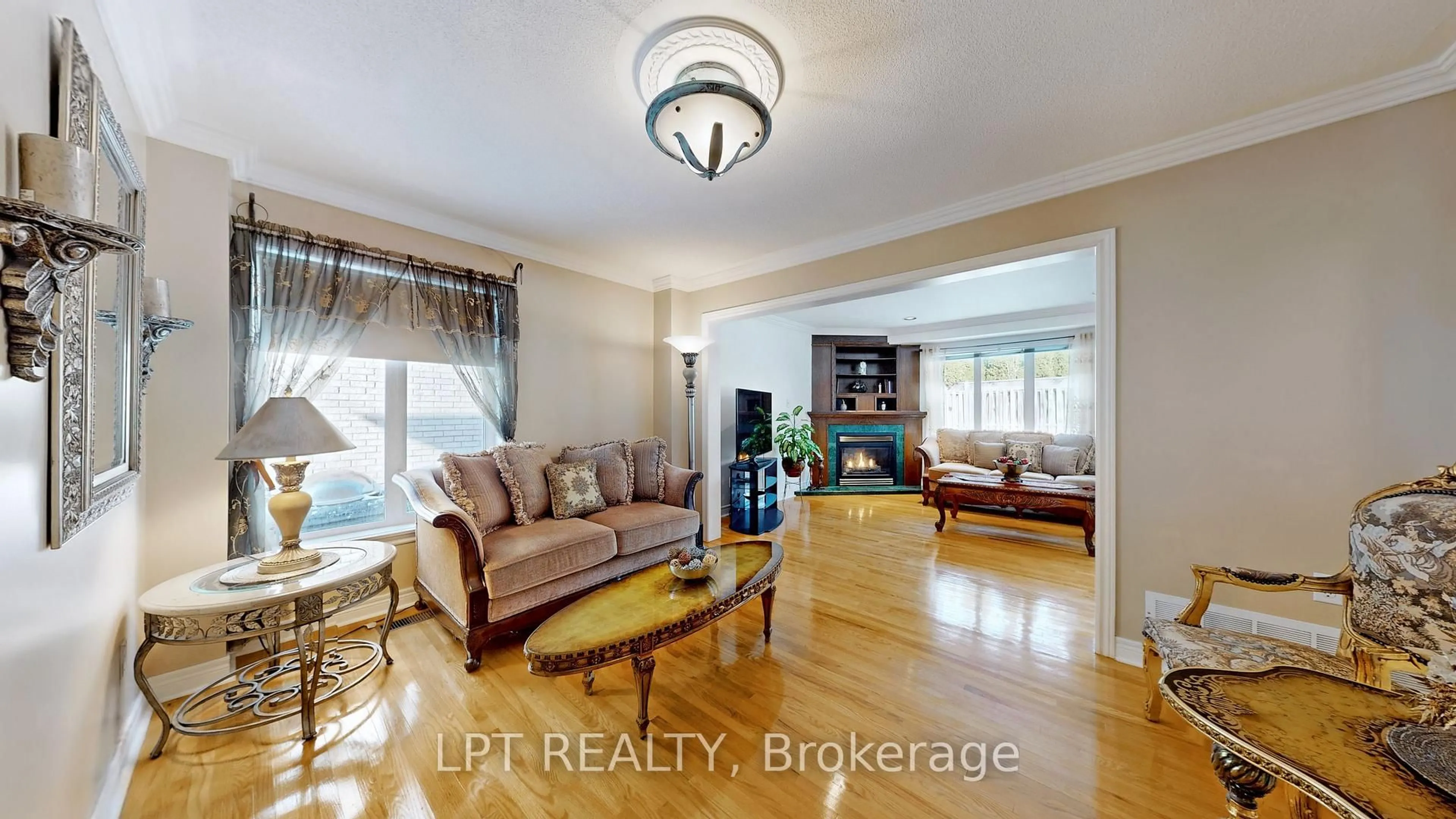 Living room with furniture, wood/laminate floor for 1887 Fairport Rd, Pickering Ontario L1V 1T5
