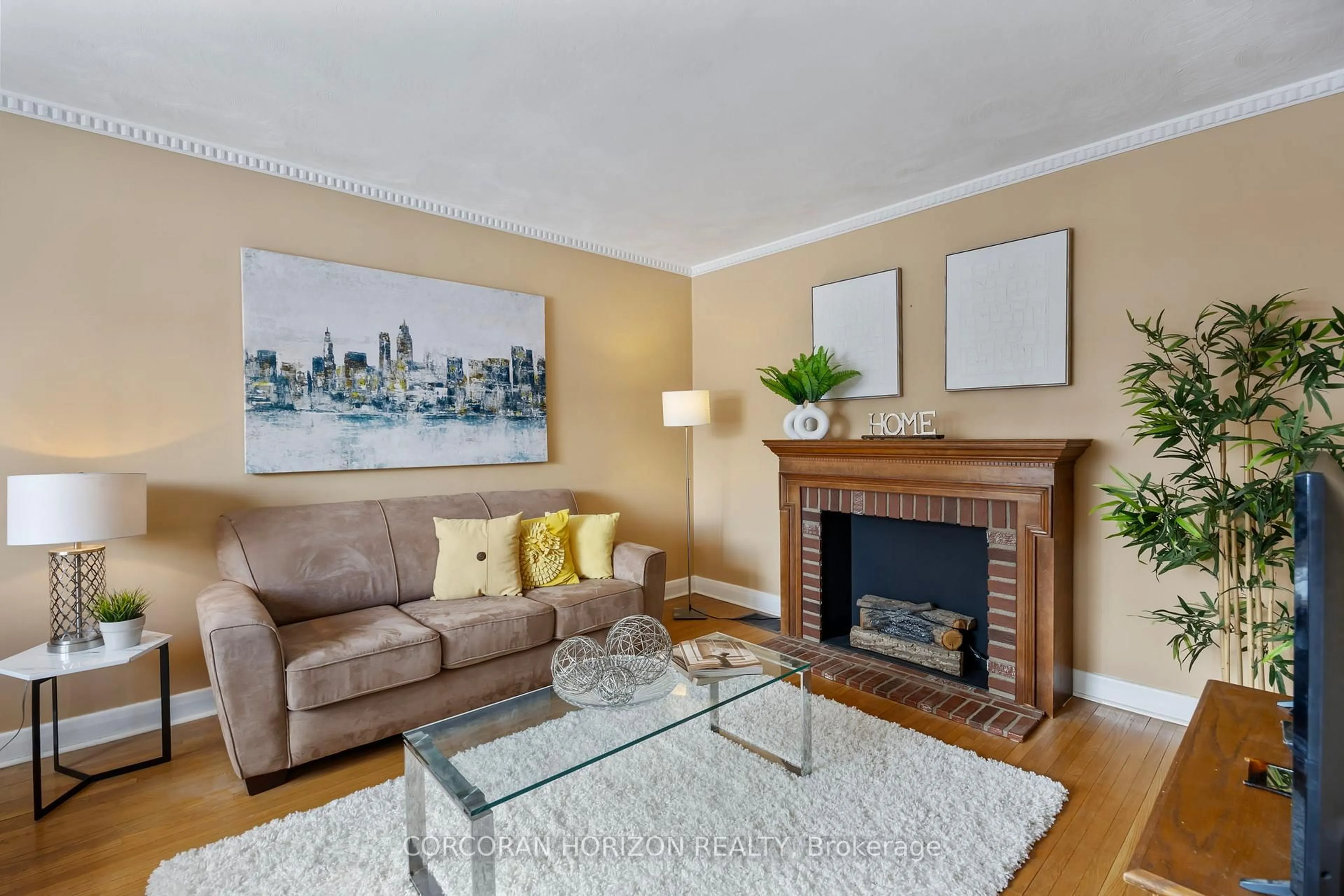 Living room with furniture, wood/laminate floor for 20 Robertsfield Cres, Toronto Ontario M1R 2X2