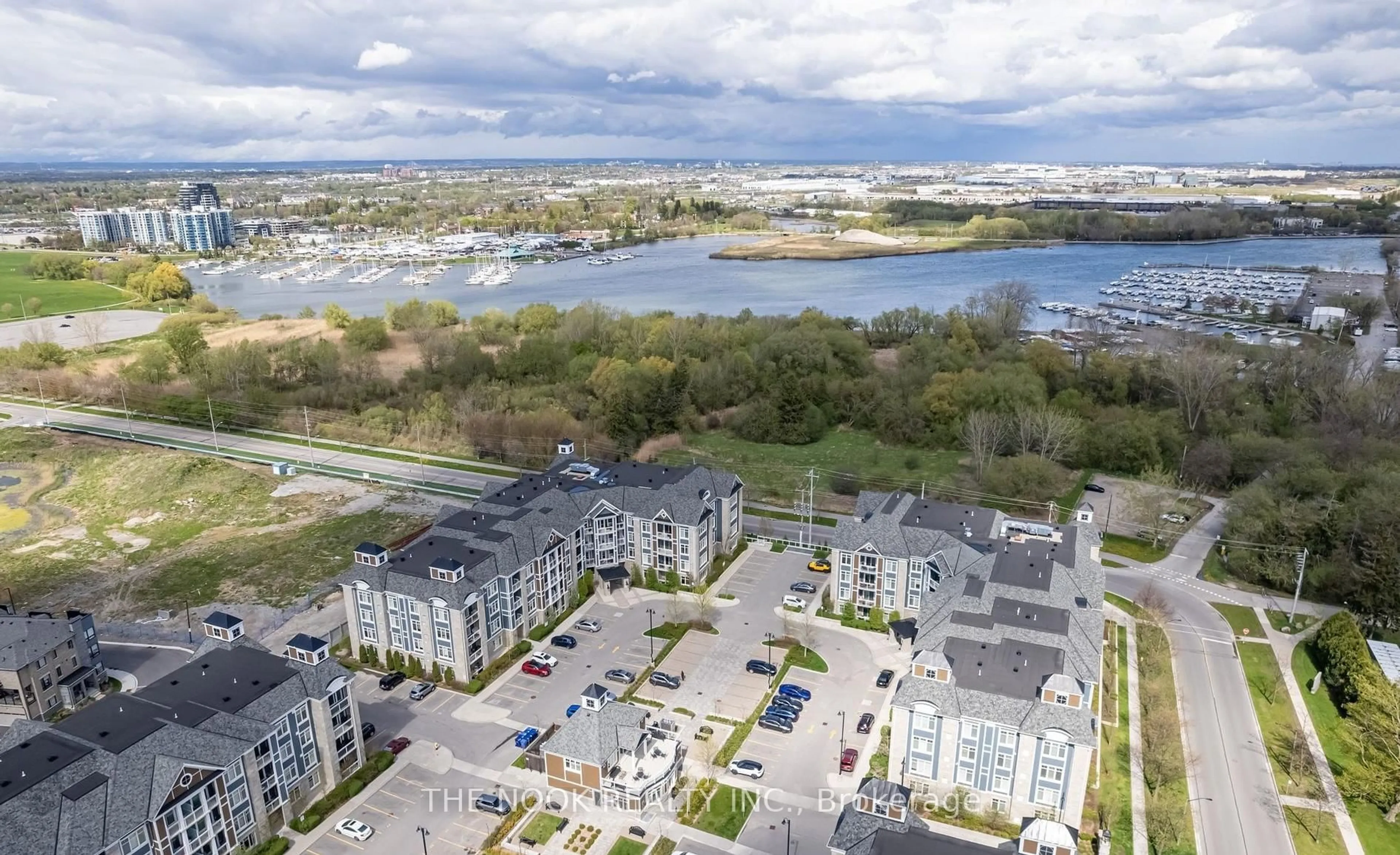 A pic from outside/outdoor area/front of a property/back of a property/a pic from drone, water/lake/river/ocean view for 670 Gordon St #213, Whitby Ontario L1N 0K9