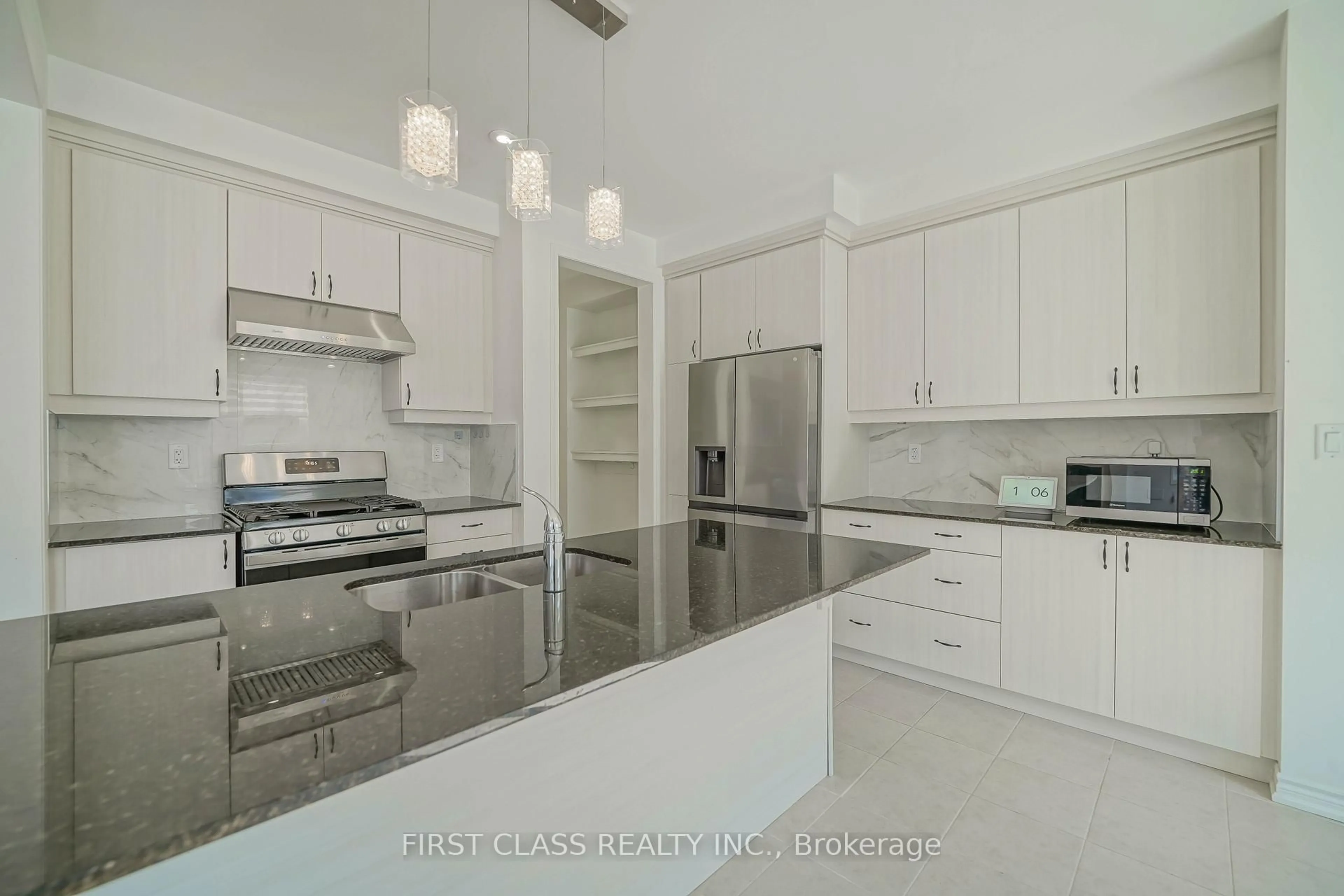 Open concept kitchen, ceramic/tile floor for 1475 mockingbird Sq, Pickering Ontario L1X 0N8