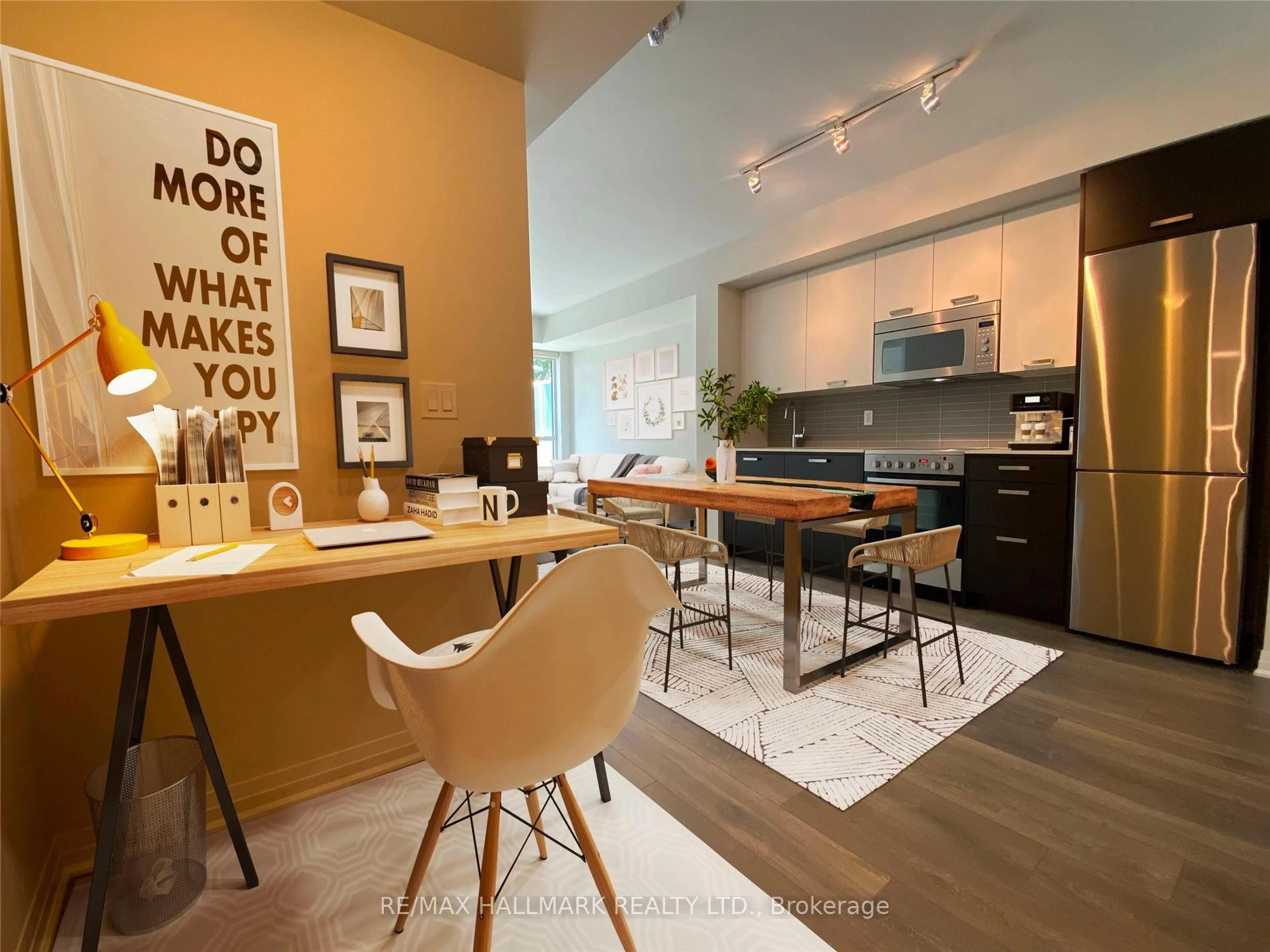 Open concept kitchen, wood/laminate floor for 2301 Danforth Ave #311, Toronto Ontario M4C 0A7