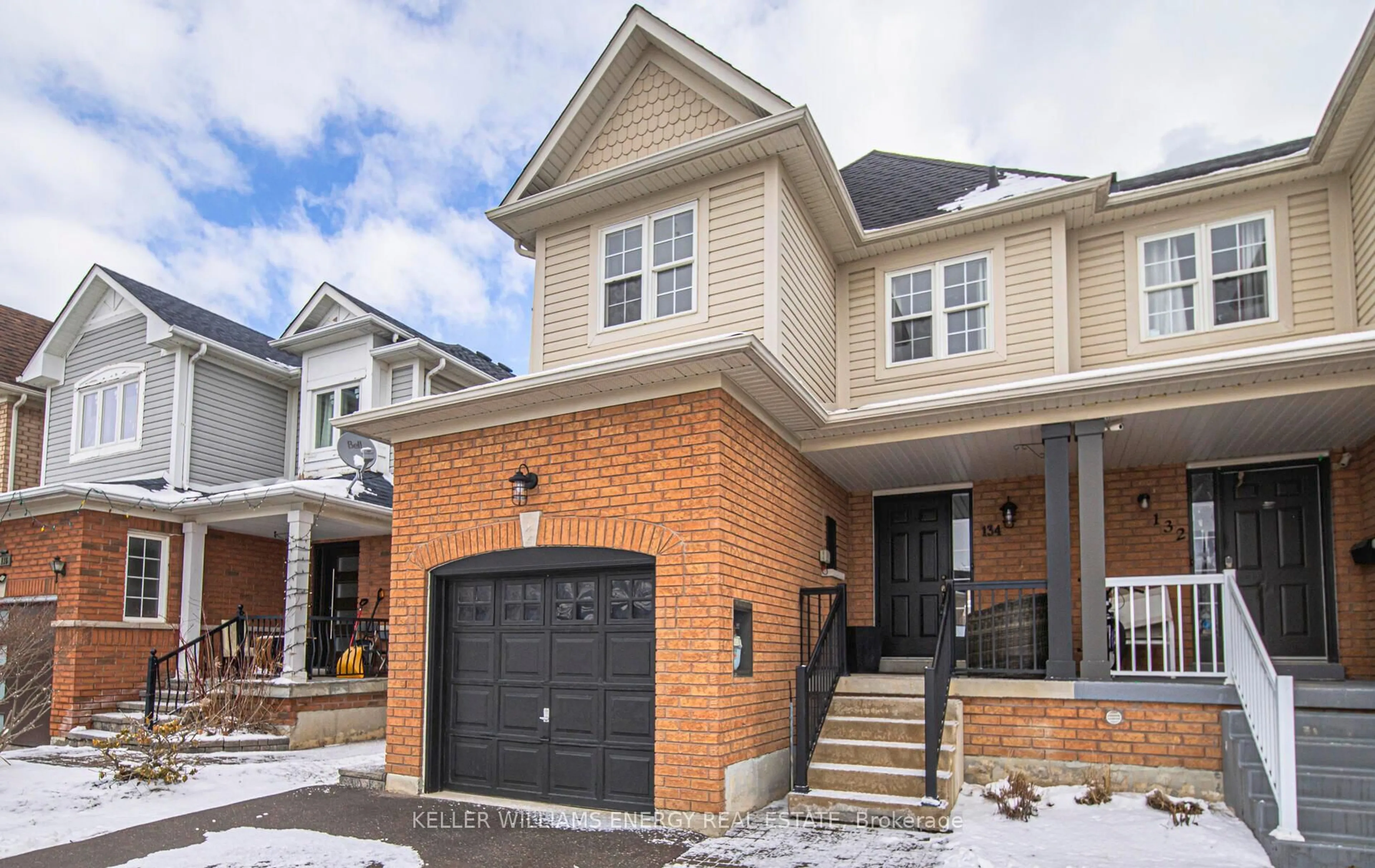 Home with brick exterior material, street for 134 Kirkland Pl, Whitby Ontario L1P 1X2
