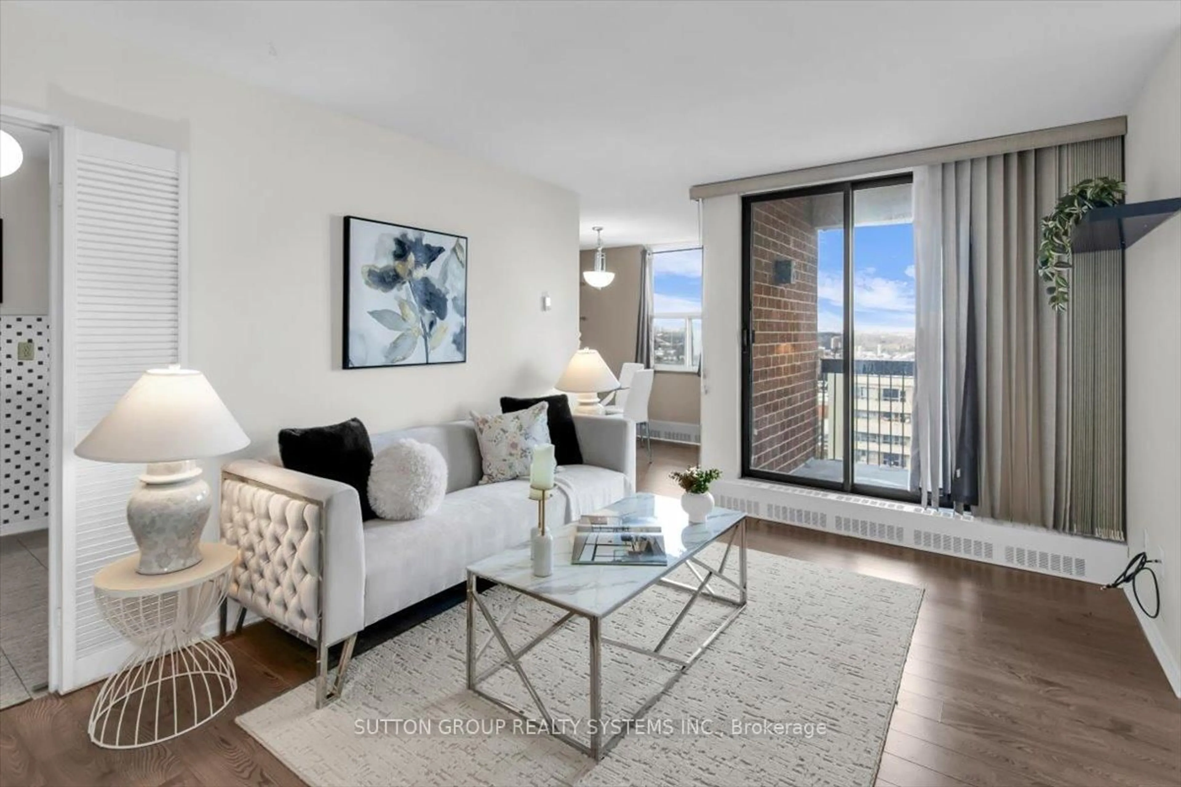 Living room with furniture, unknown for 90 Ling Rd #PH109, Toronto Ontario M1E 4Y3