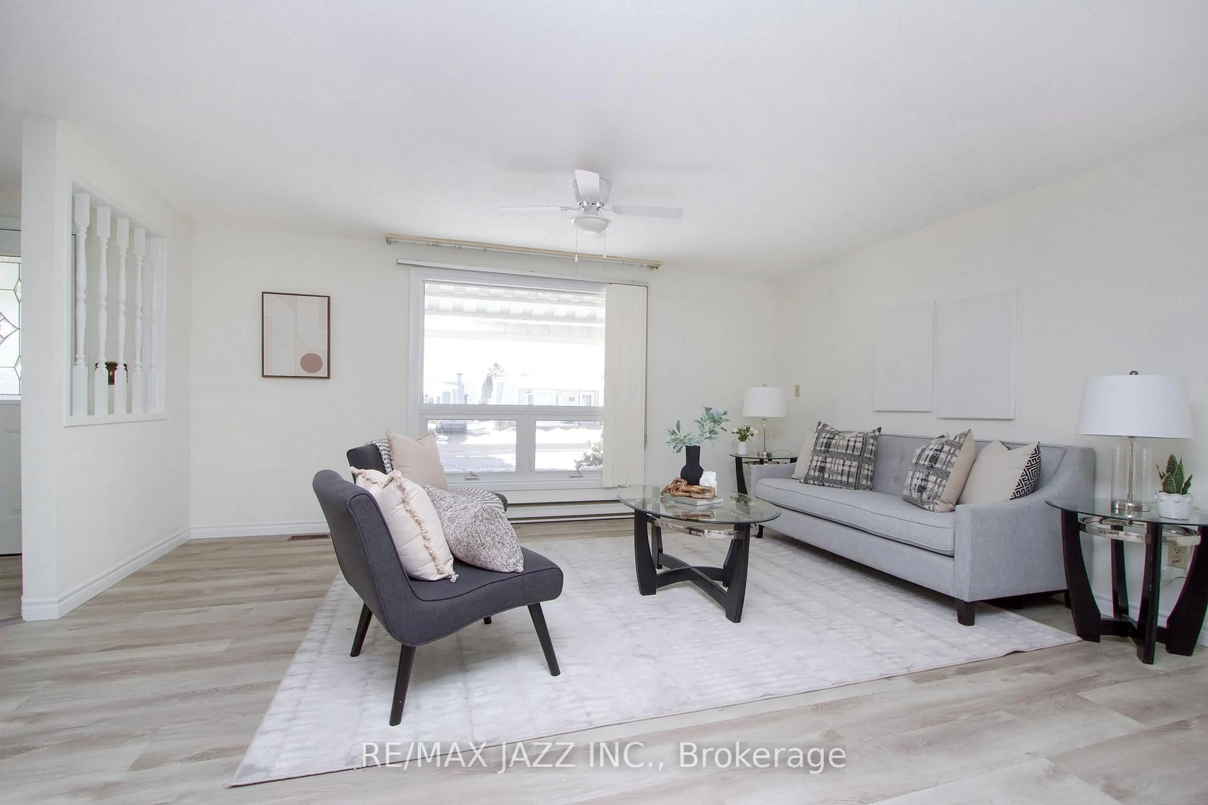 Living room with furniture, wood/laminate floor for 13 Steelhead Lane, Clarington Ontario L1B 1B4