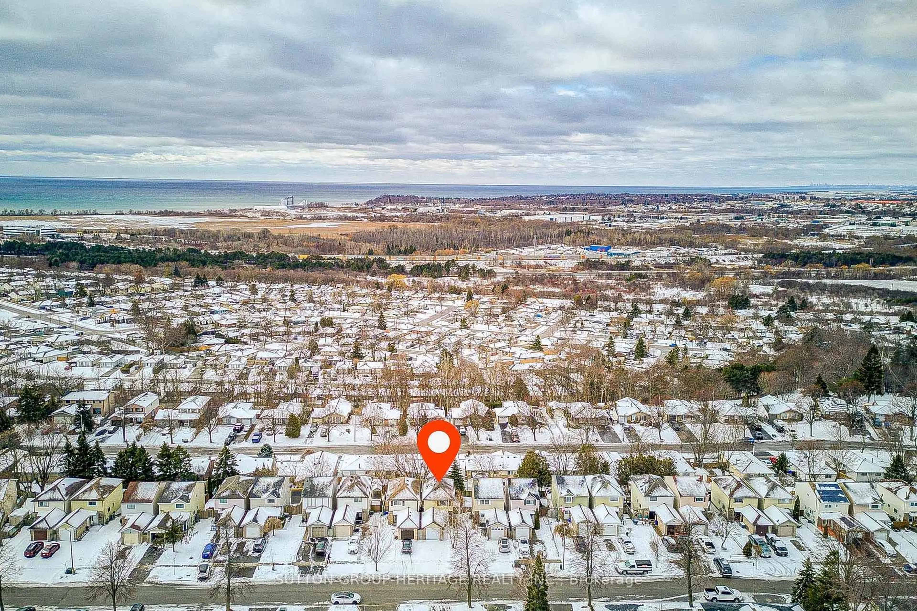 A pic from outside/outdoor area/front of a property/back of a property/a pic from drone, water/lake/river/ocean view for 639 Down Cres, Oshawa Ontario L1H 7X9