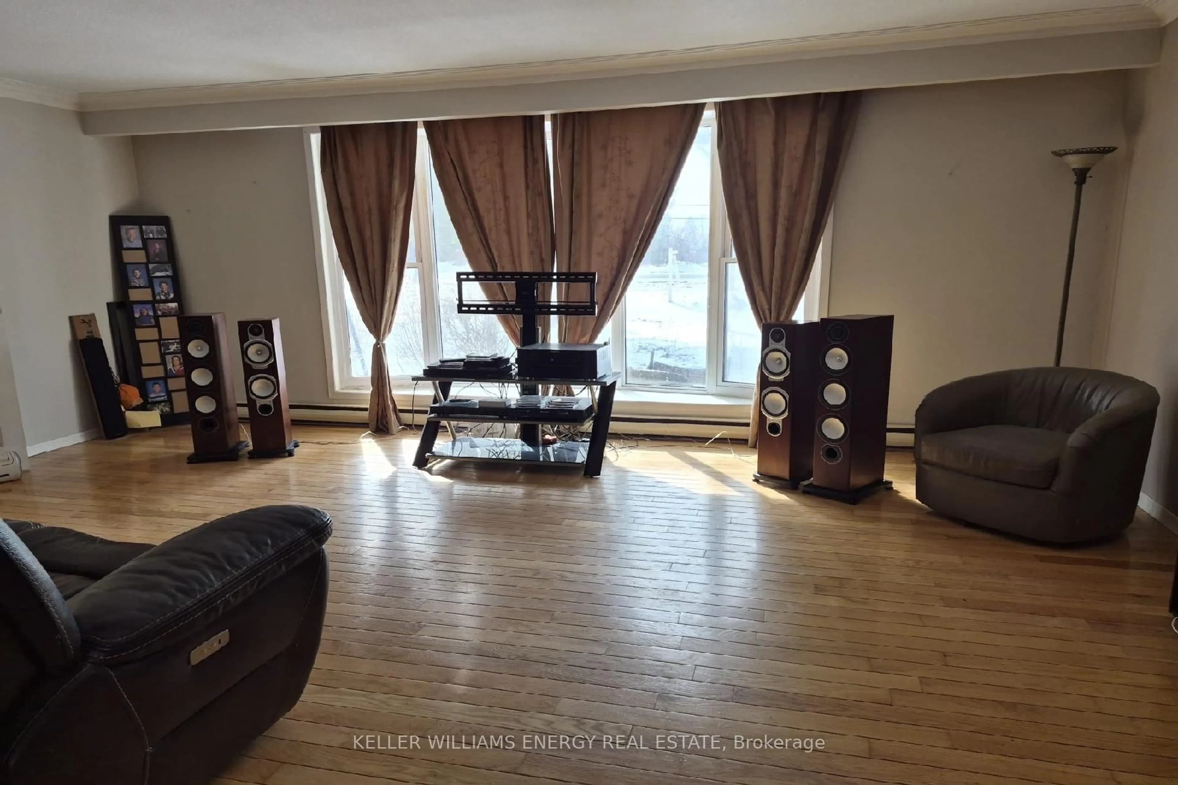 Living room with furniture, wood/laminate floor for 3440 7A Highway, Scugog Ontario L0B 1L0