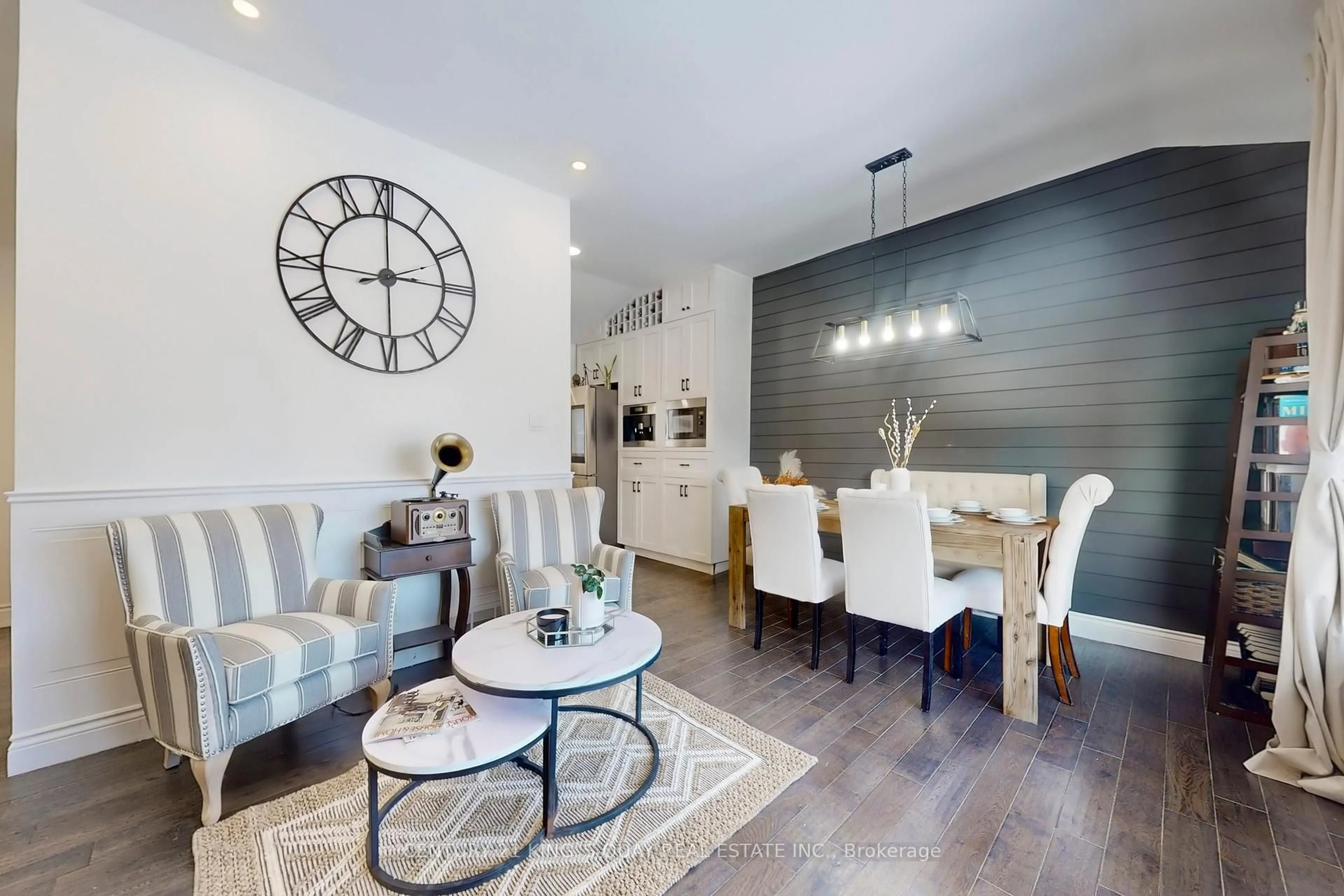 Living room with furniture, wood/laminate floor for 618 Sunset Blvd, Clarington Ontario L1B 1C9