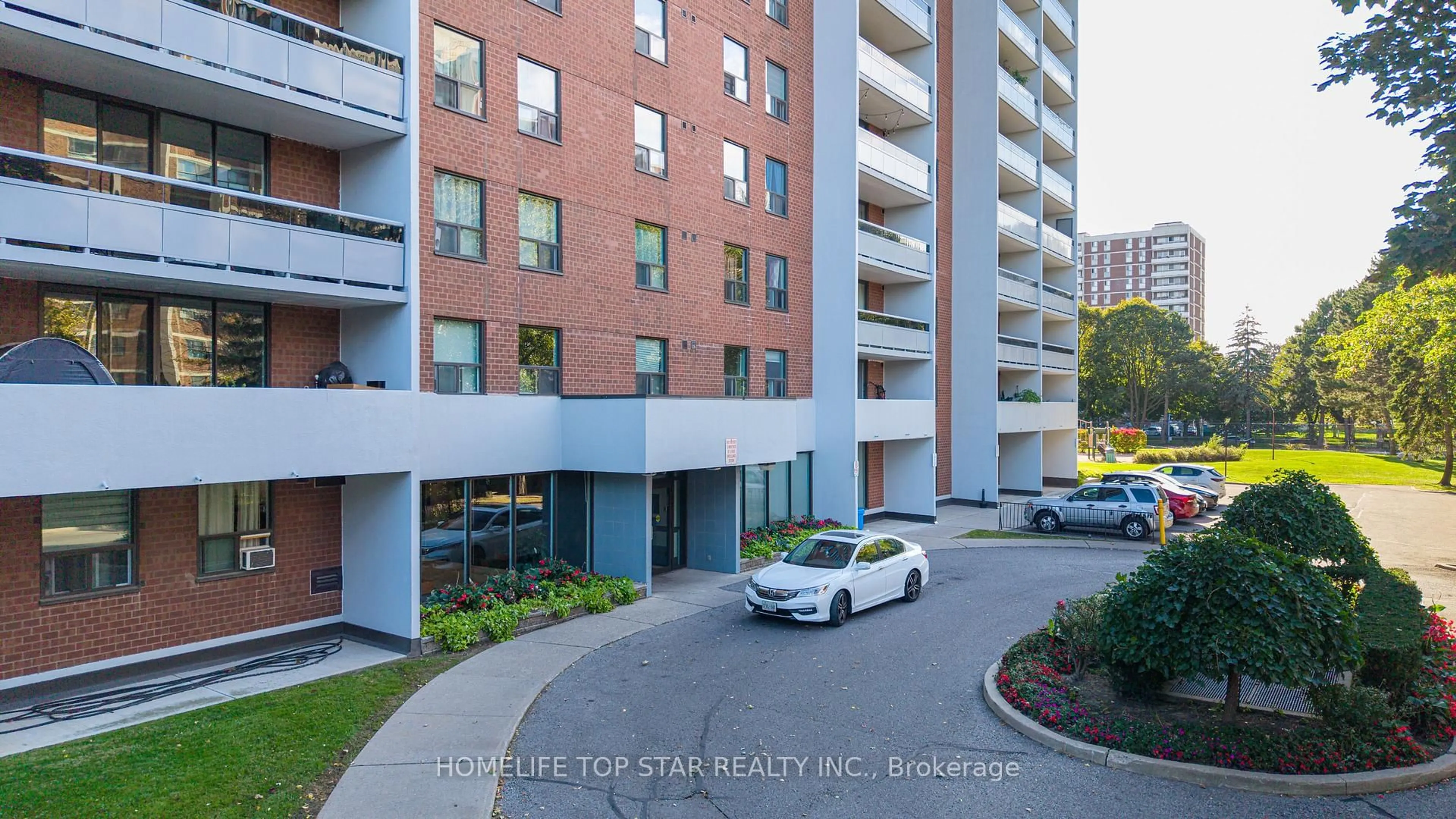 A pic from outside/outdoor area/front of a property/back of a property/a pic from drone, unknown for 1250 Bridletowne Circ #501, Toronto Ontario M1W 2V1
