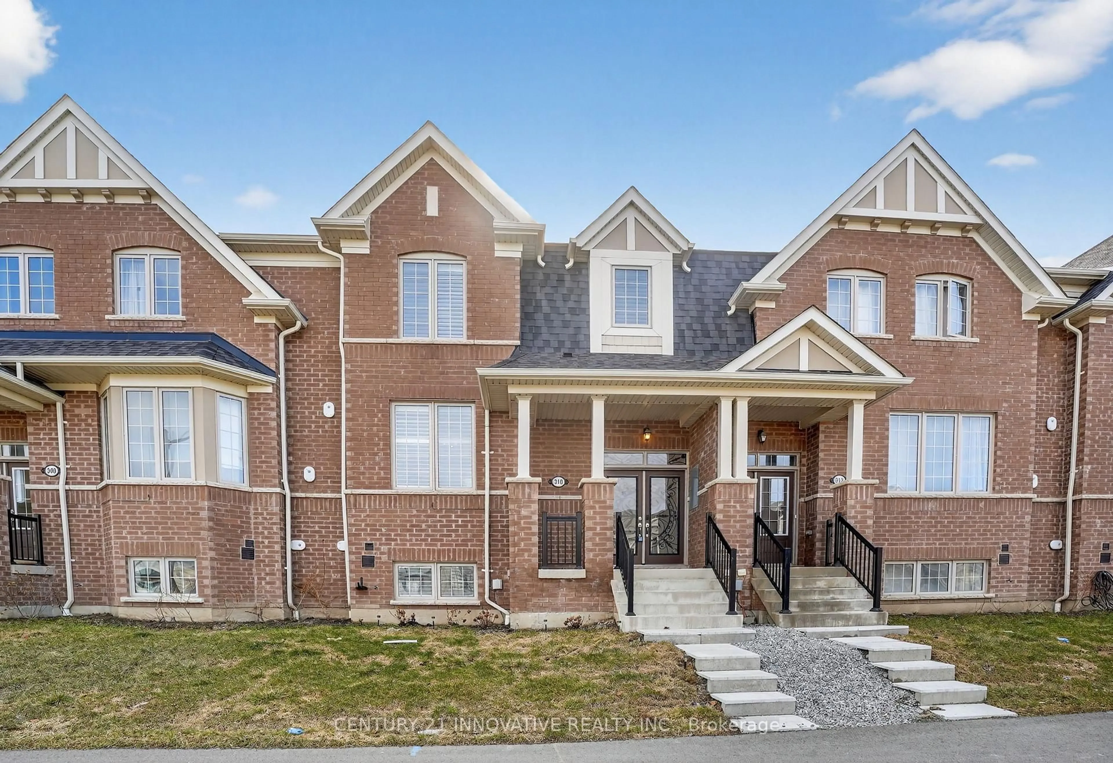 Home with brick exterior material, street for 310 Coronation Rd, Whitby Ontario L1P 0K8