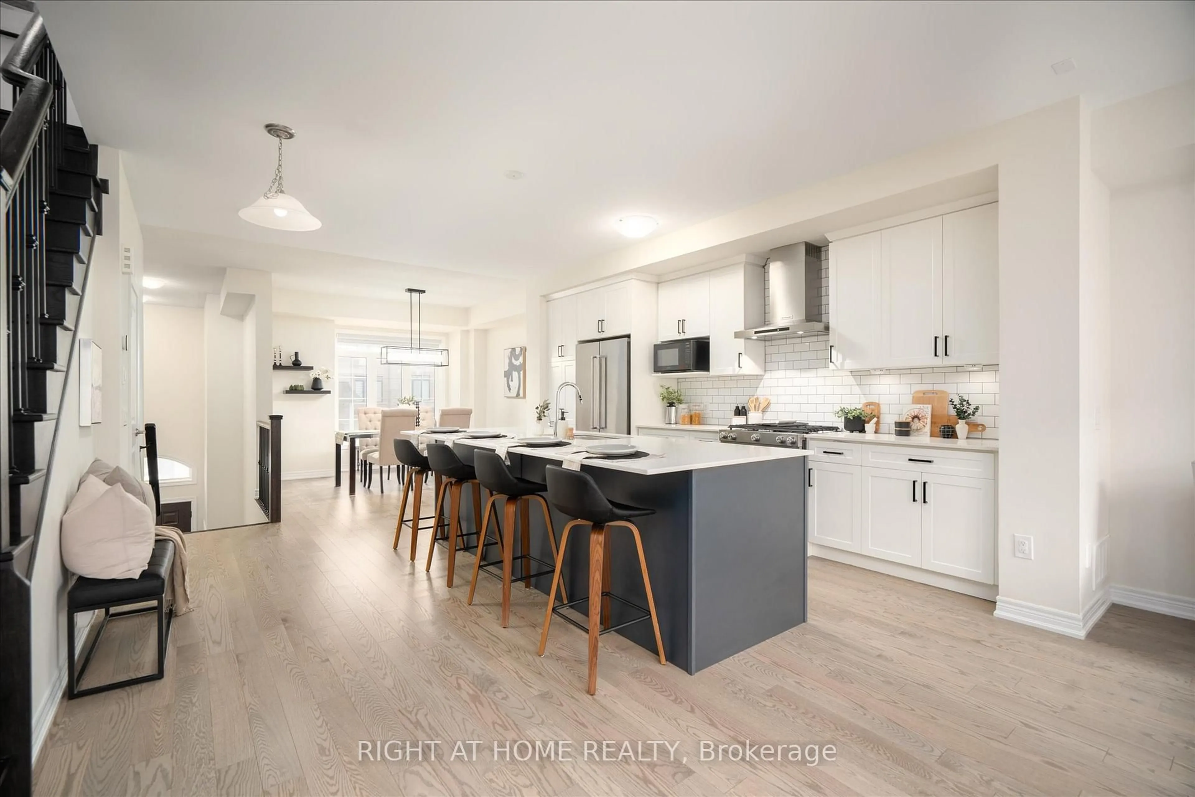 Open concept kitchen, wood/laminate floor for 87 Dorian Dr, Whitby Ontario L1P 0C8