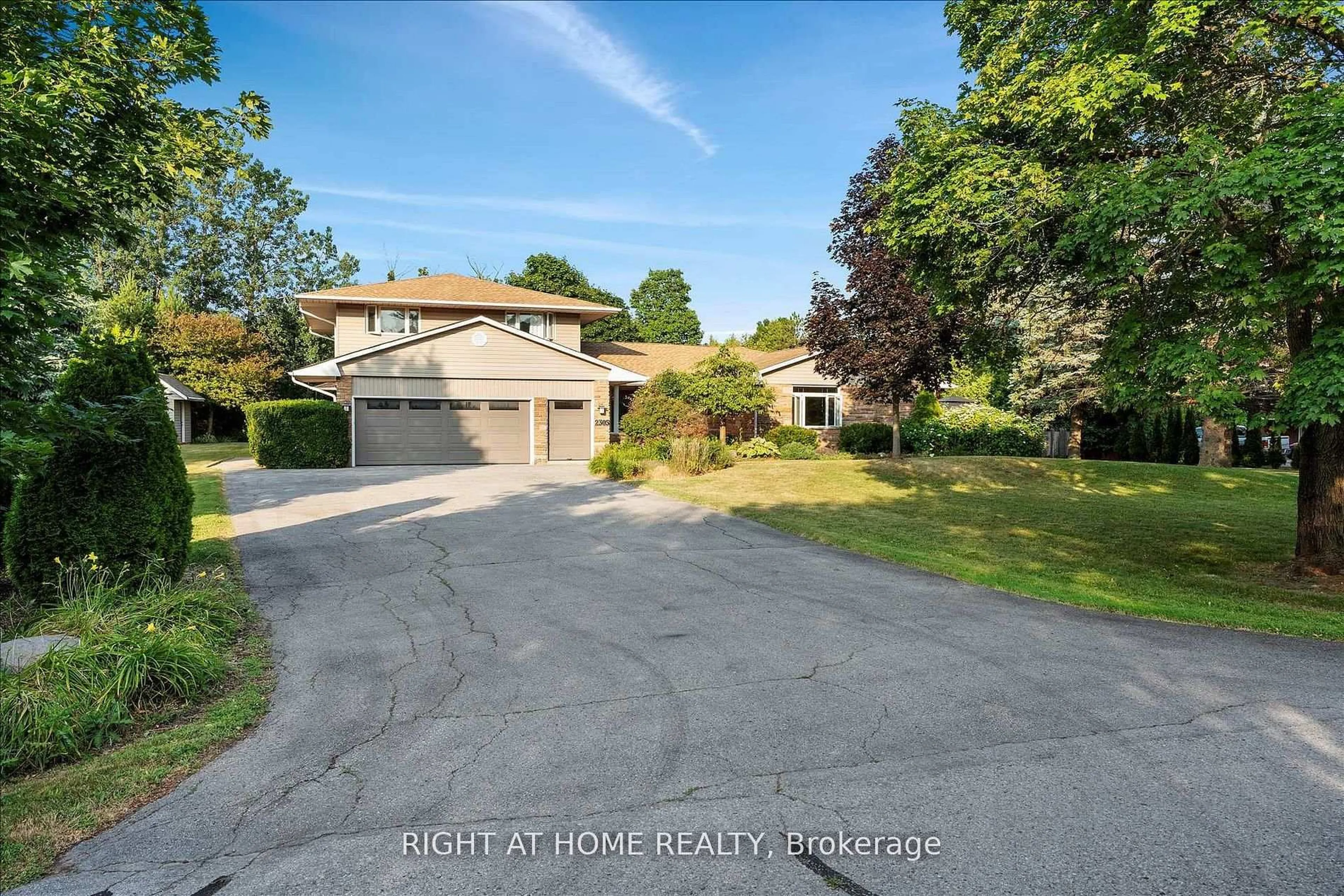 A pic from outside/outdoor area/front of a property/back of a property/a pic from drone, street for 2305 Bowmanville Ave, Clarington Ontario L1C 6W9