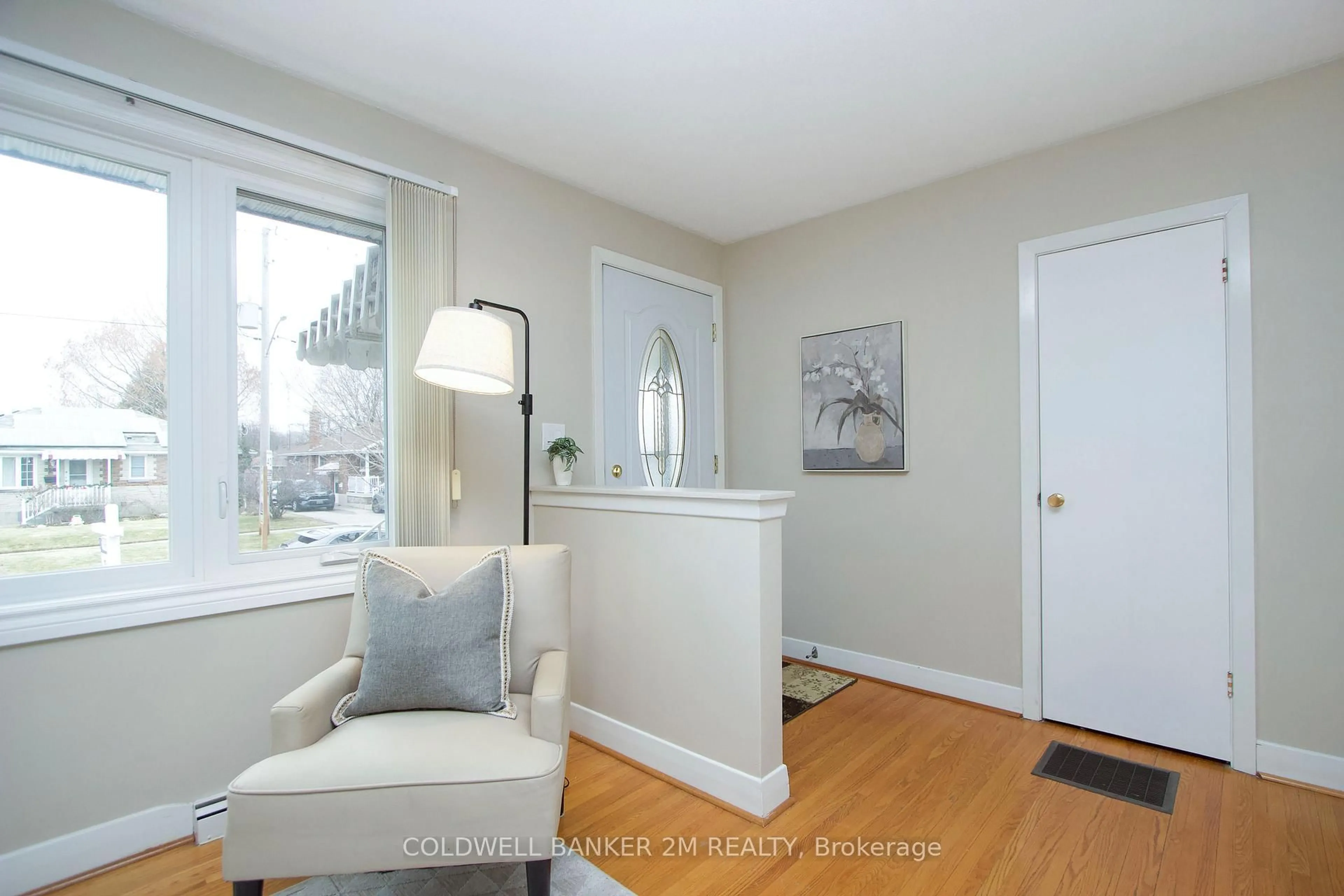 Living room with furniture, wood/laminate floor for 357 Highland Ave, Oshawa Ontario L1H 6B2