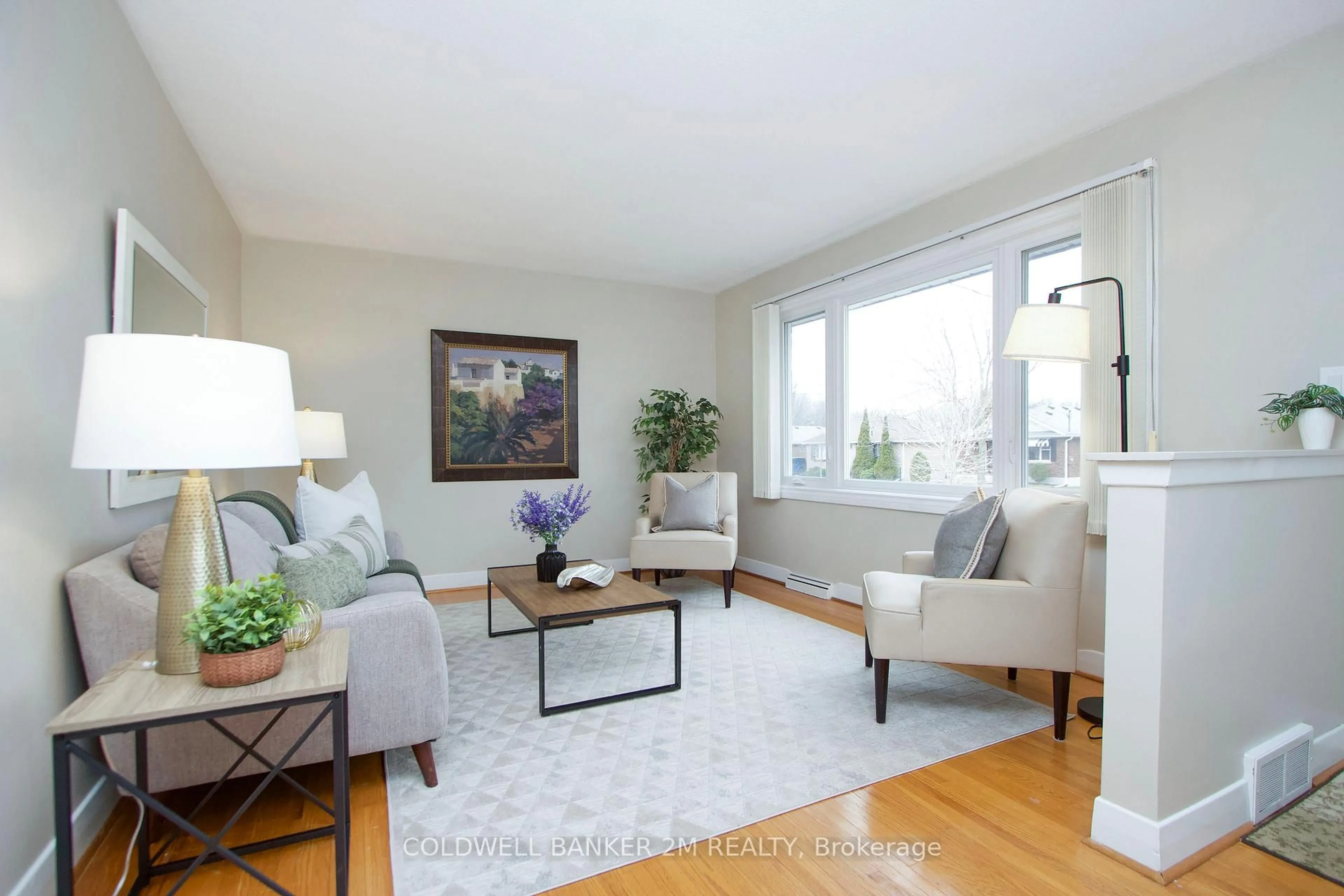 Living room with furniture, wood/laminate floor for 357 Highland Ave, Oshawa Ontario L1H 6B2