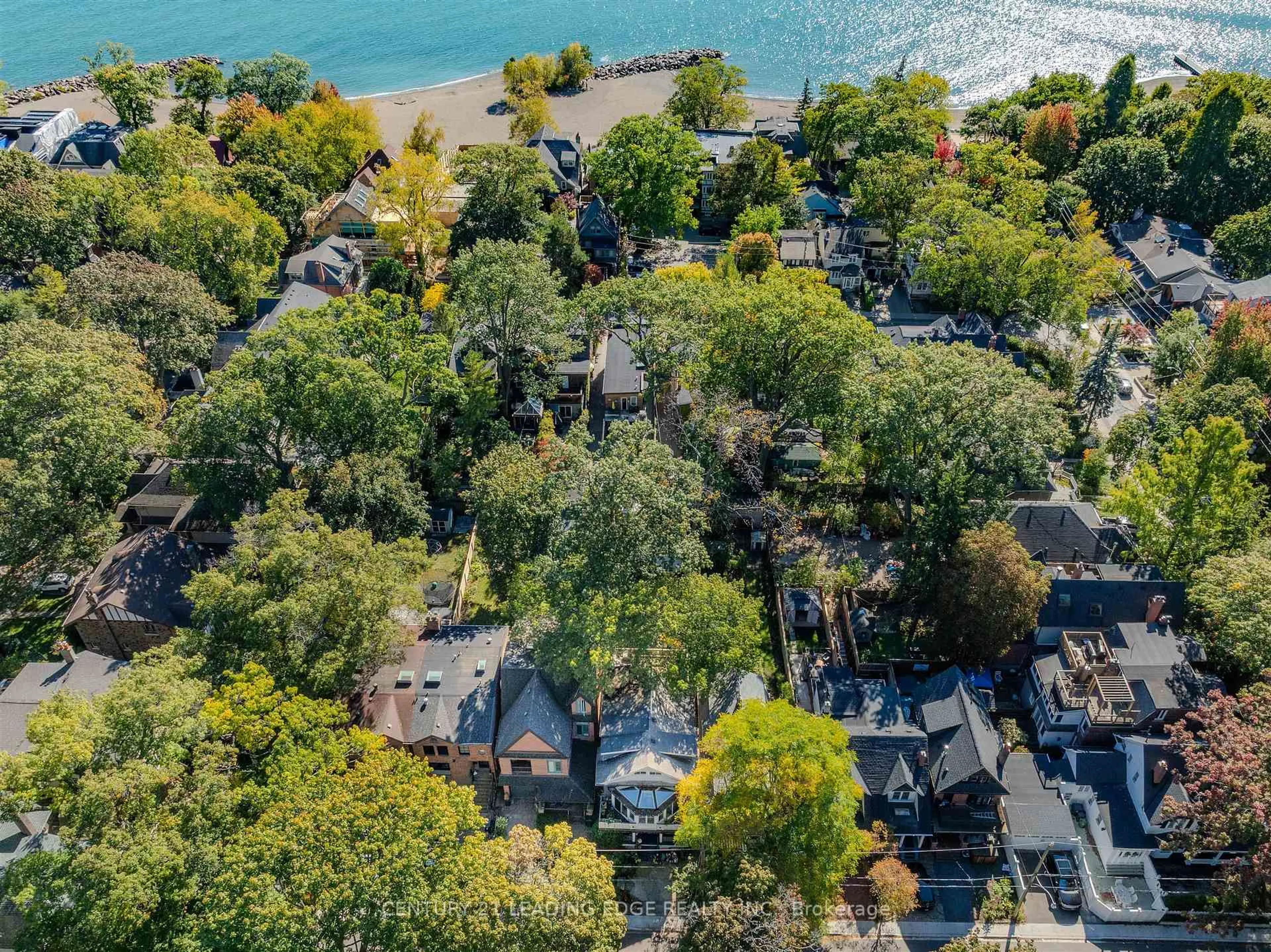 A pic from outside/outdoor area/front of a property/back of a property/a pic from drone, water/lake/river/ocean view for 9 Balmy Ave, Toronto Ontario M4E 1C7