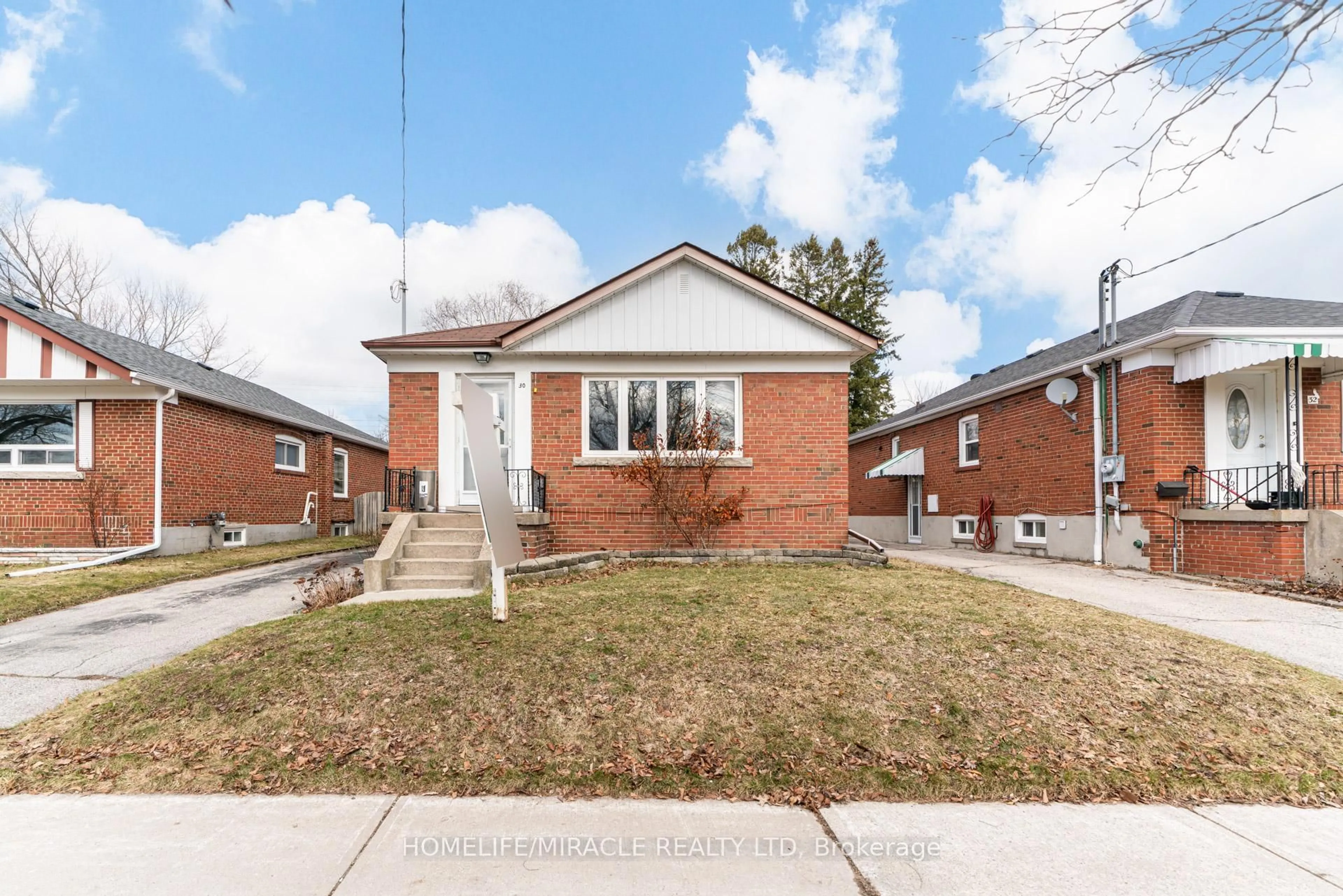 Home with brick exterior material, street for 30 Yorkshire Rd, Toronto Ontario M1K 3B6