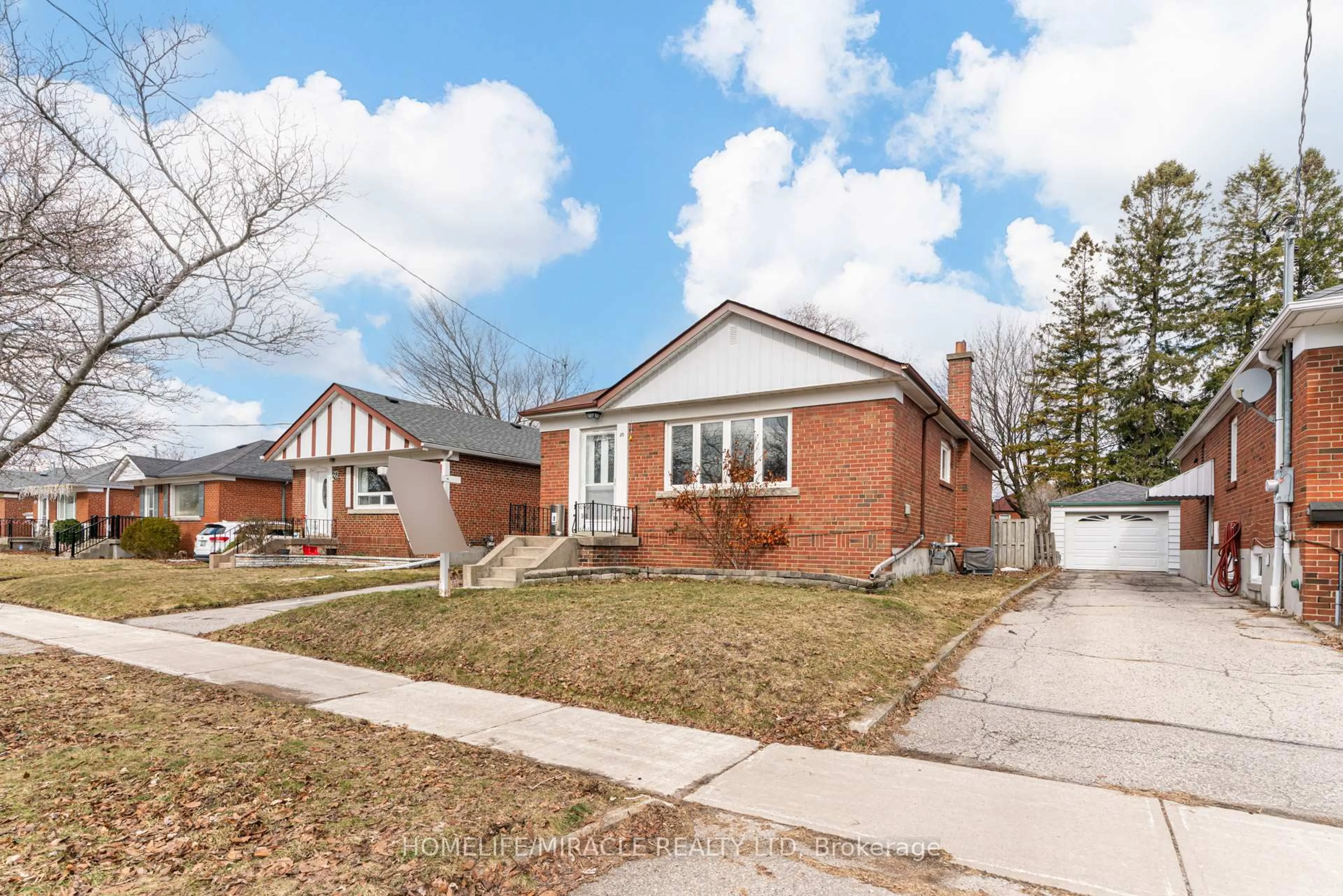 Home with brick exterior material, street for 30 Yorkshire Rd, Toronto Ontario M1K 3B6