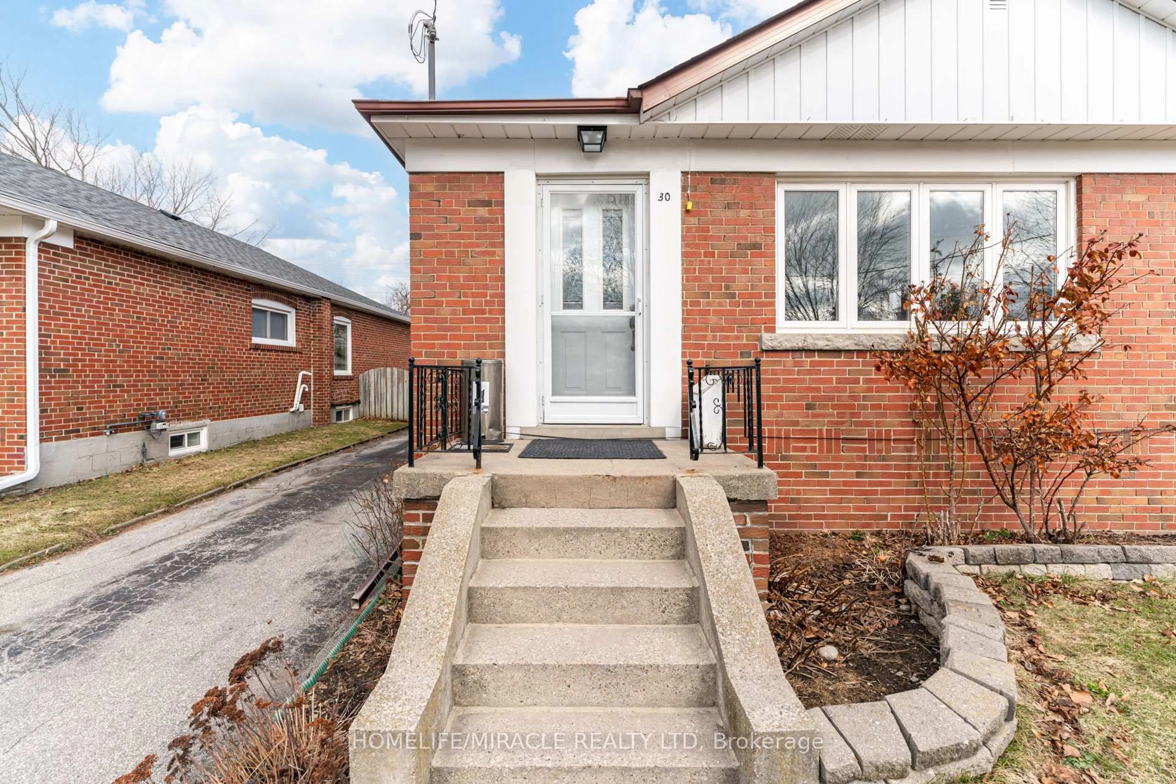 Home with brick exterior material, street for 30 Yorkshire Rd, Toronto Ontario M1K 3B6