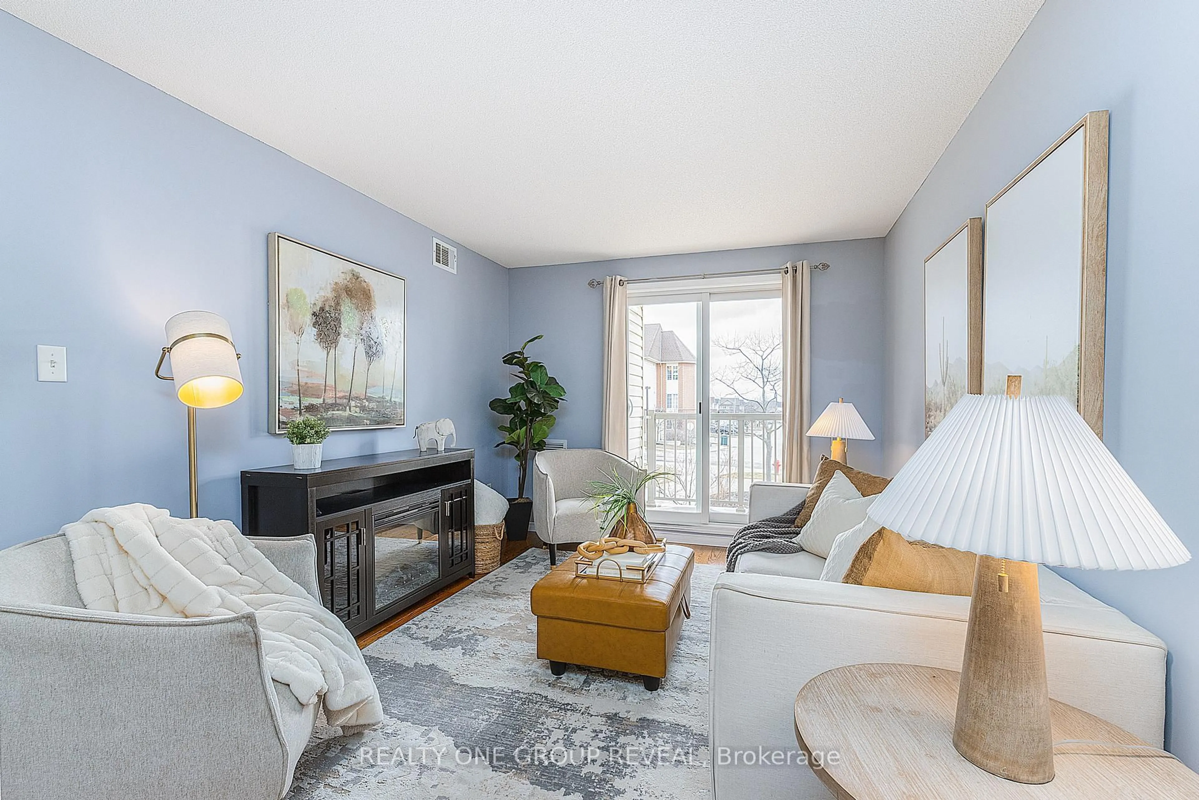 Living room with furniture, unknown for 31 Petra Way #2, Whitby Ontario L1R 0A7