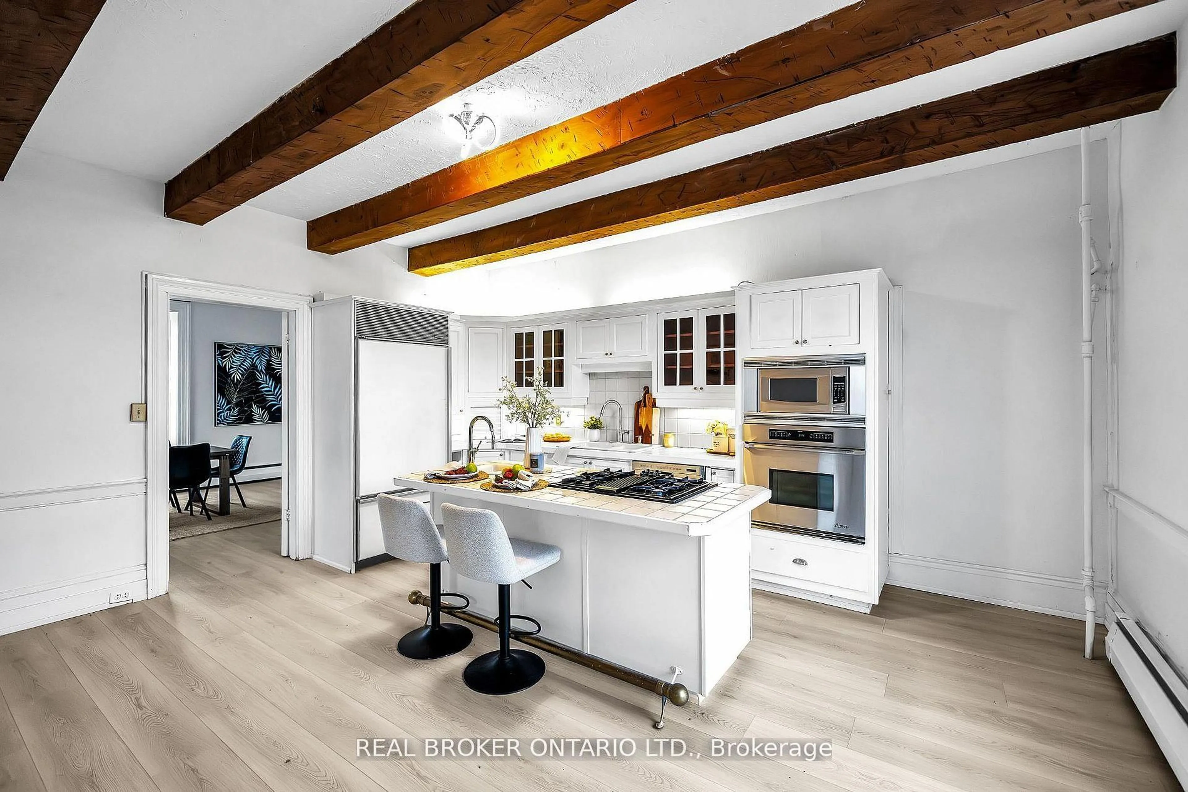 Open concept kitchen, wood/laminate floor for 780 Garden St, Whitby Ontario L1N 8P2