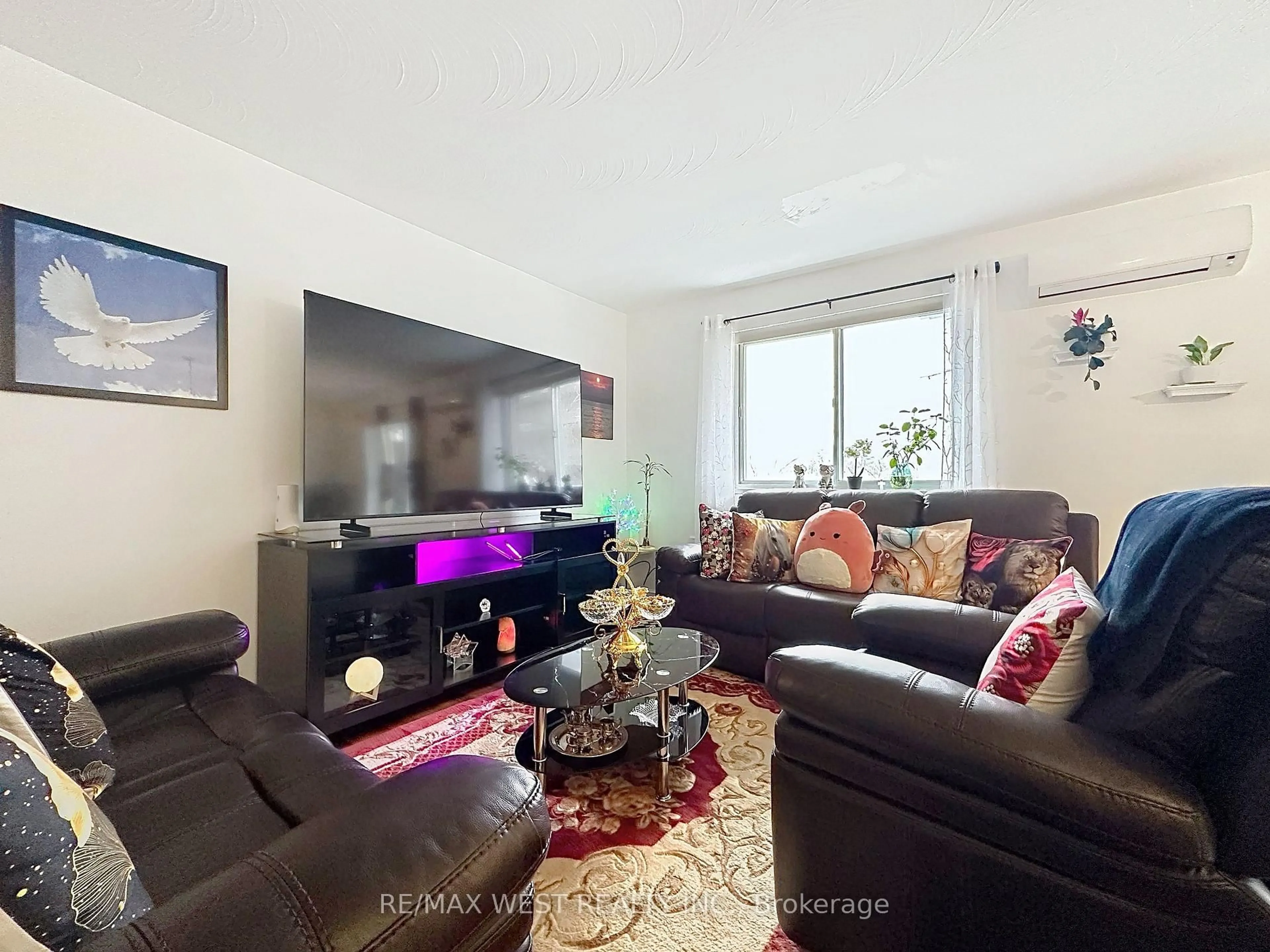 Living room with furniture, unknown for 800 Kennedy Rd #206, Toronto Ontario M1K 2C9