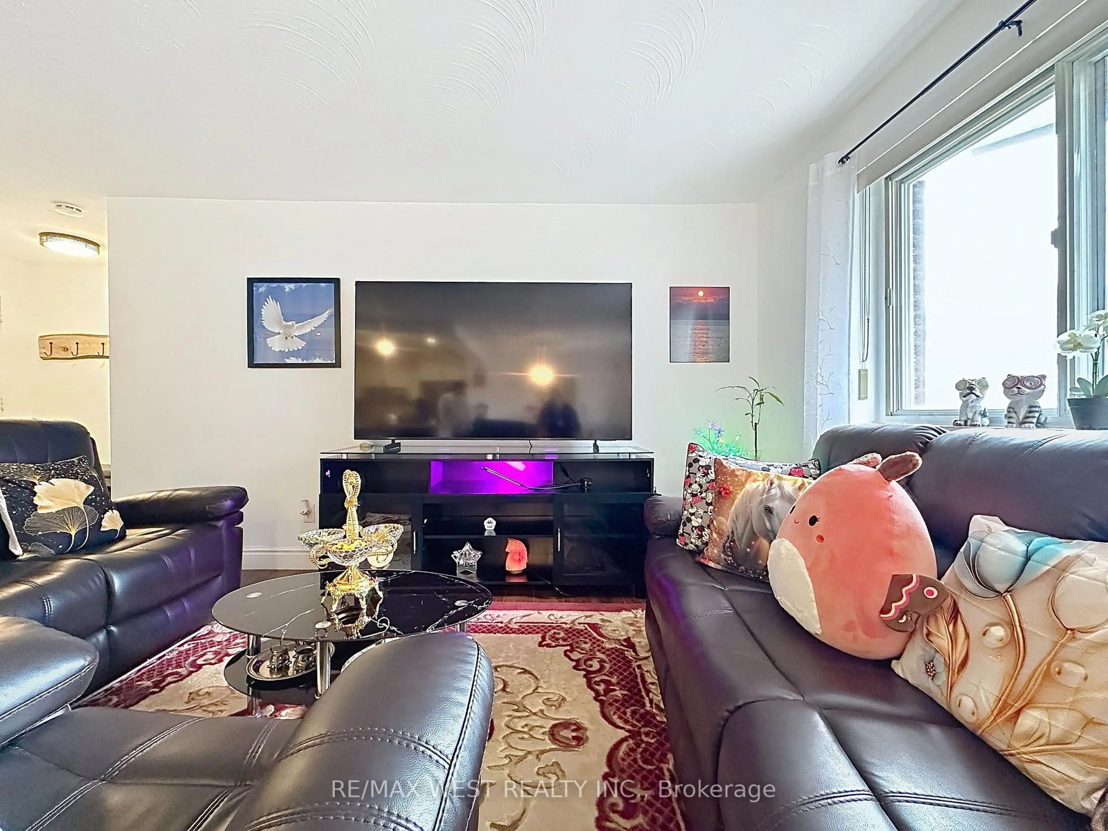 Living room with furniture, unknown for 800 Kennedy Rd #206, Toronto Ontario M1K 2C9