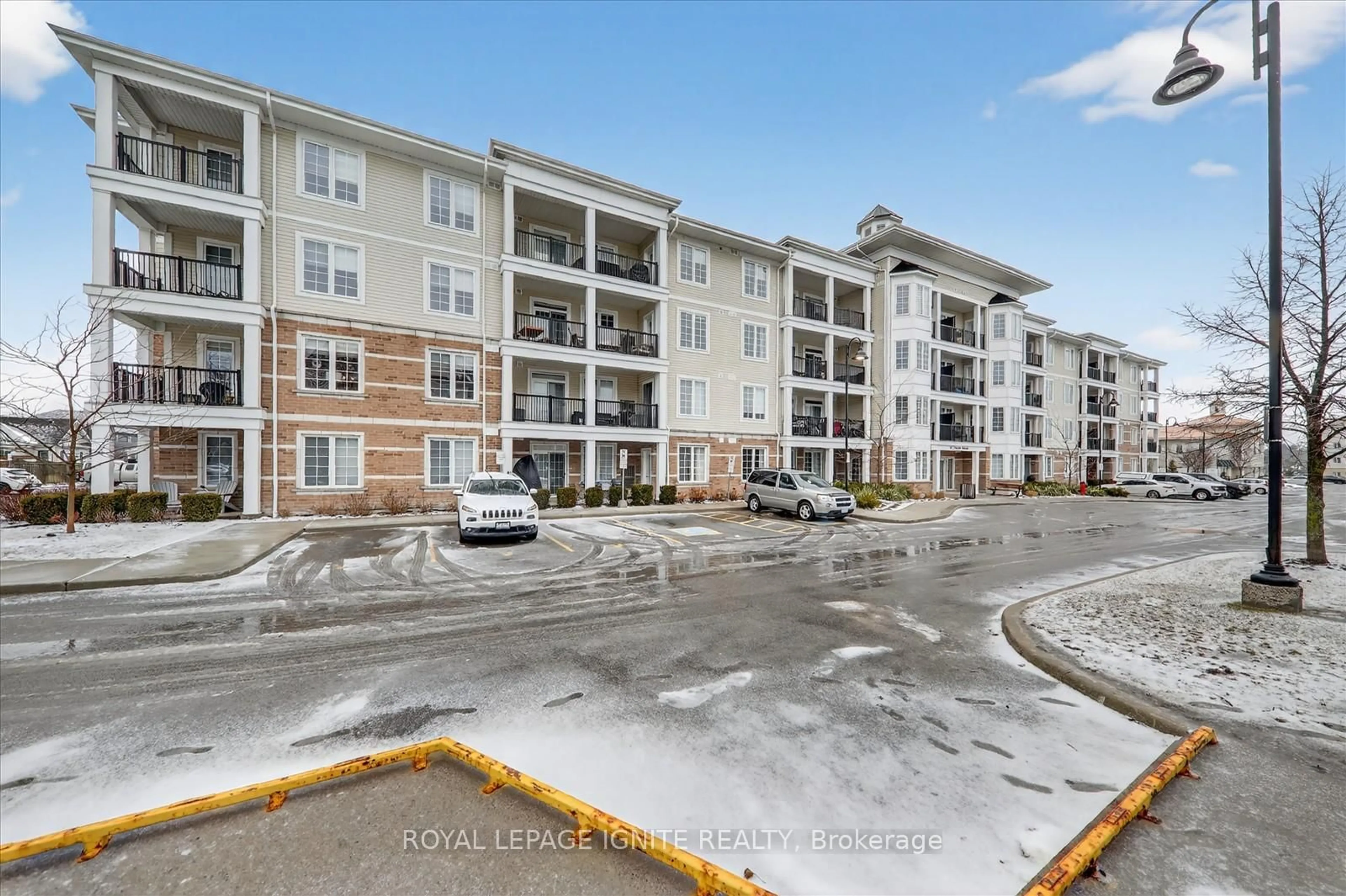 A pic from outside/outdoor area/front of a property/back of a property/a pic from drone, unknown for 65 Shipway Ave #214, Clarington Ontario L1B 0W2