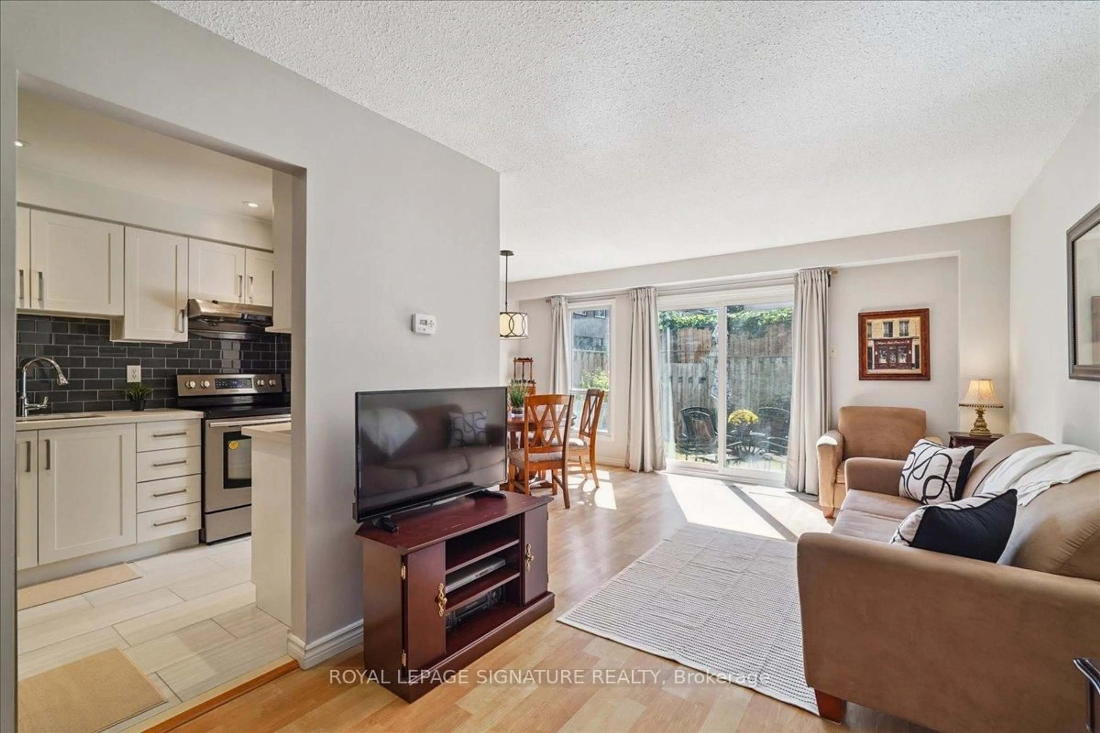 Living room with furniture, unknown for 1131 Sandhurst Circ #52, Toronto Ontario M1V 1V5