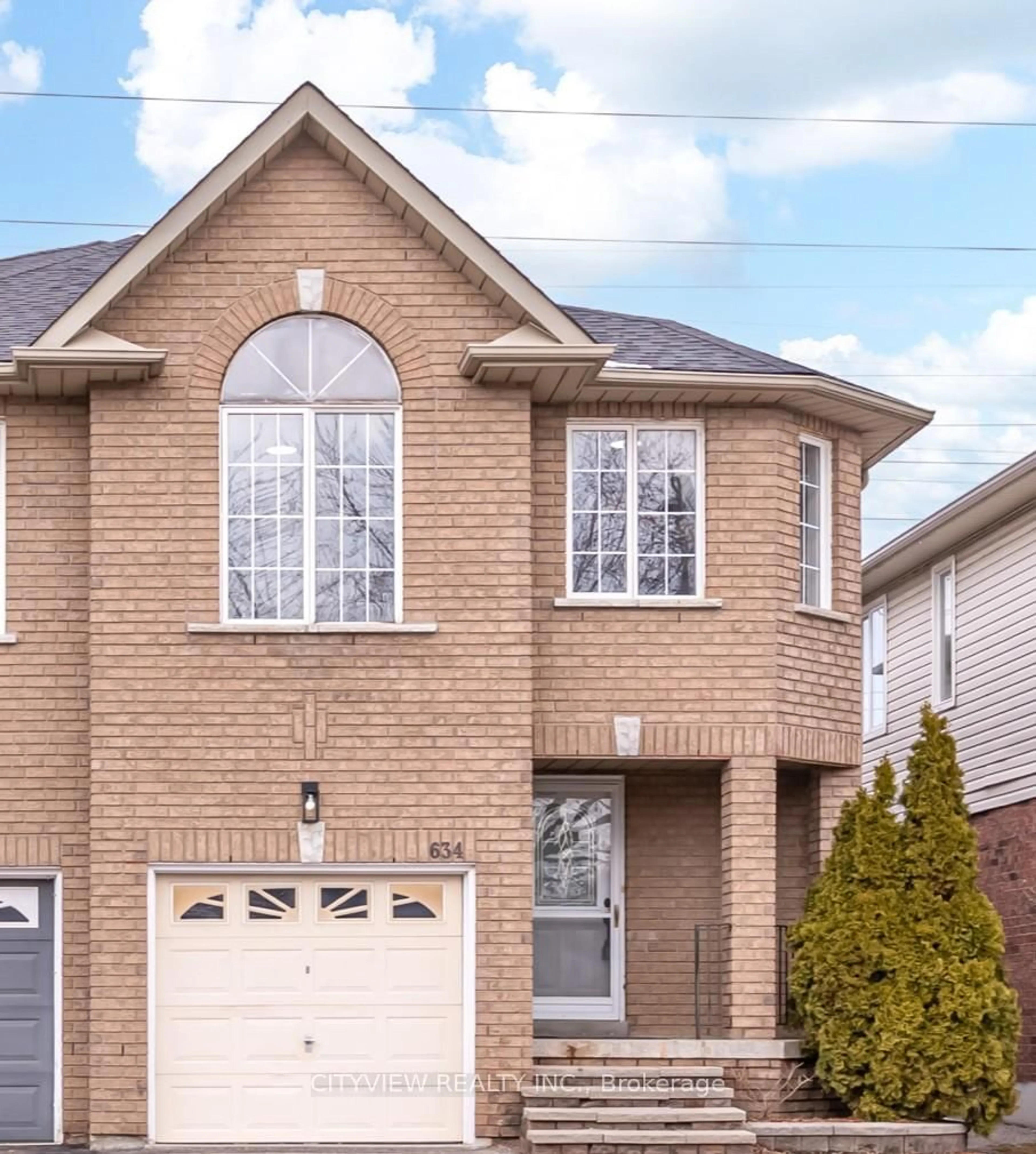 Home with brick exterior material, street for 634 Amaretto Ave, Pickering Ontario L1X 2V2