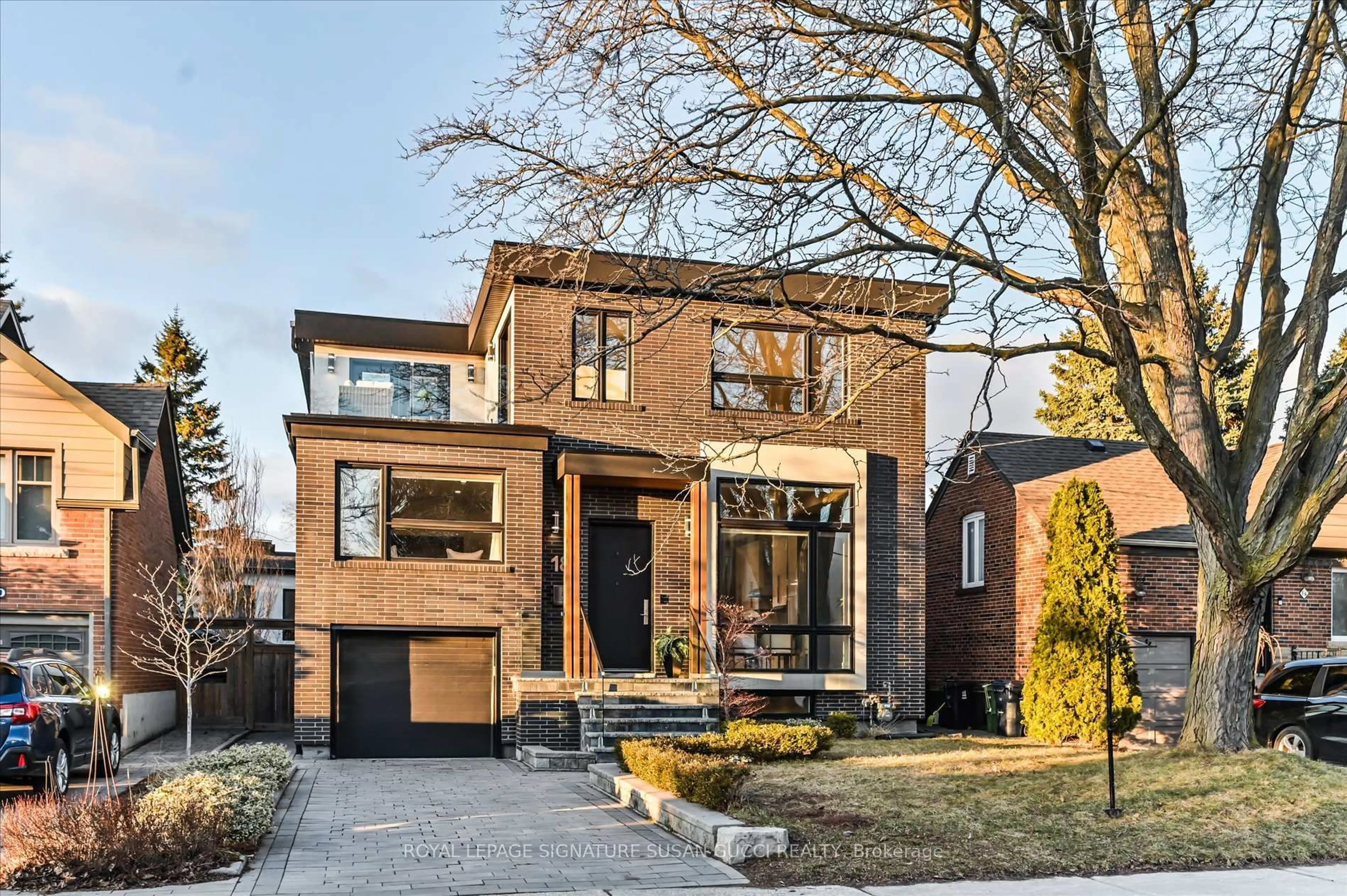 Home with brick exterior material, street for 18 Ferris Rd, Toronto Ontario M4B 1G1