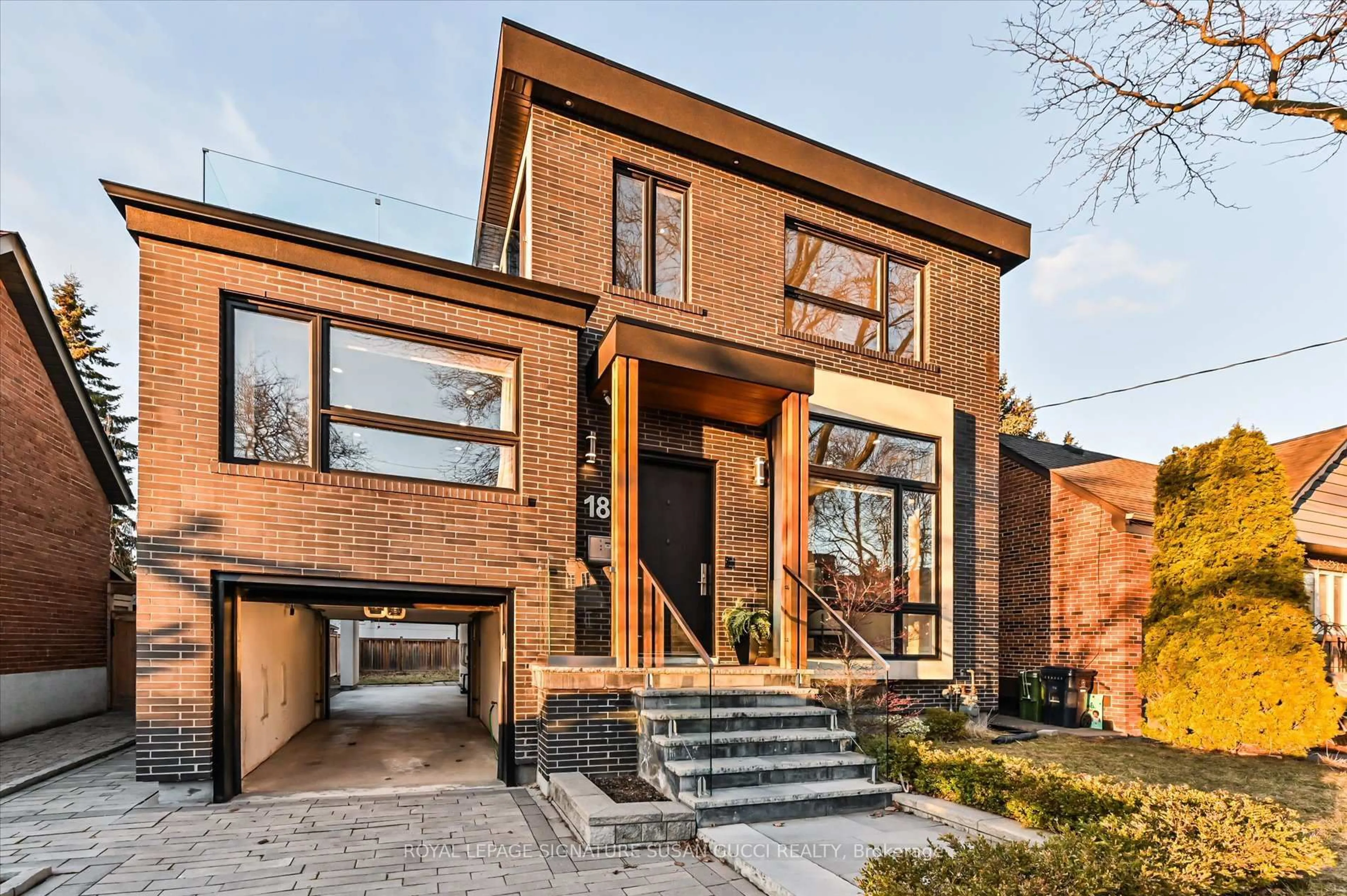 Home with brick exterior material, street for 18 Ferris Rd, Toronto Ontario M4B 1G1