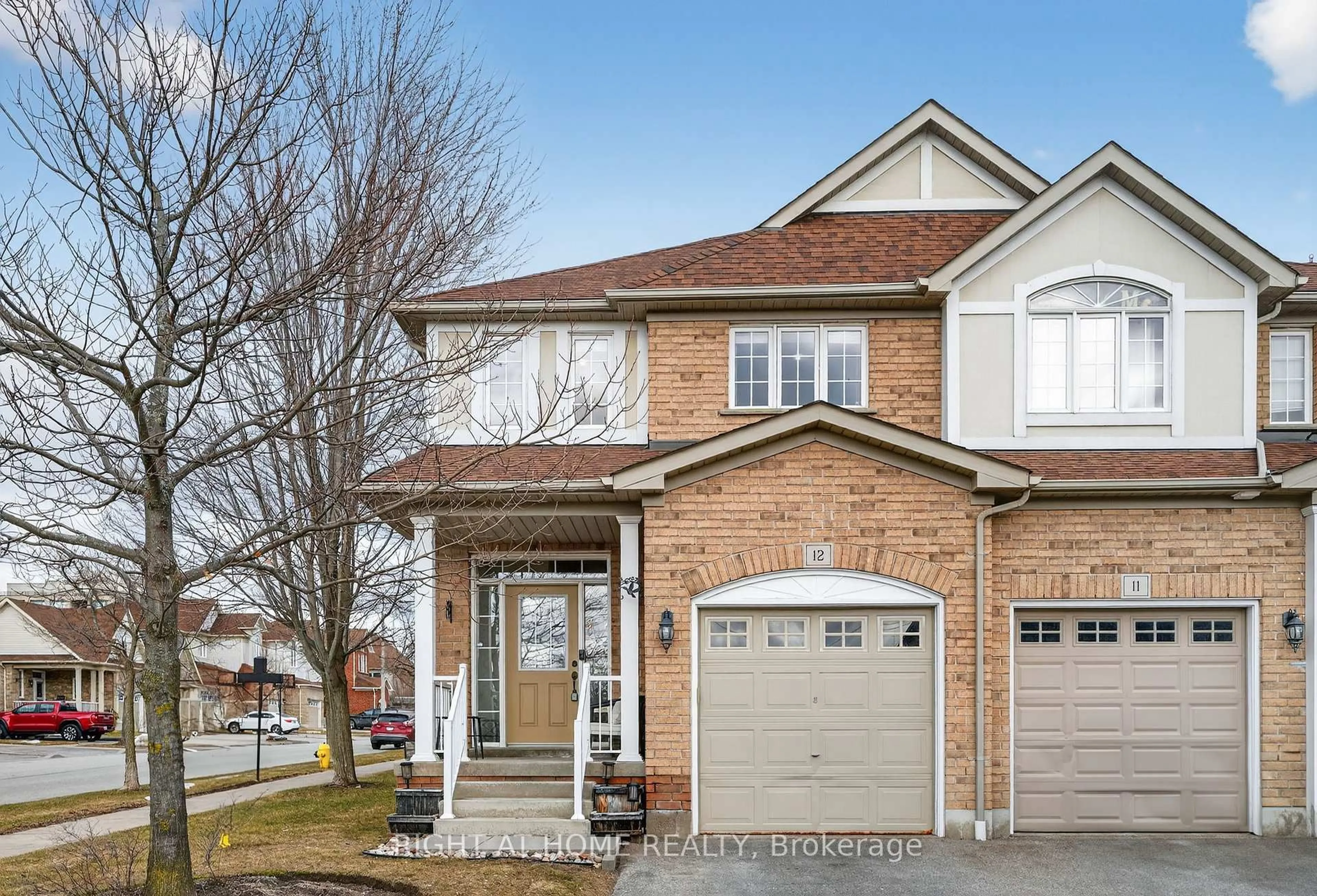 Home with brick exterior material, street for 1070 Glenbourne Dr #12, Oshawa Ontario L1K 0L1