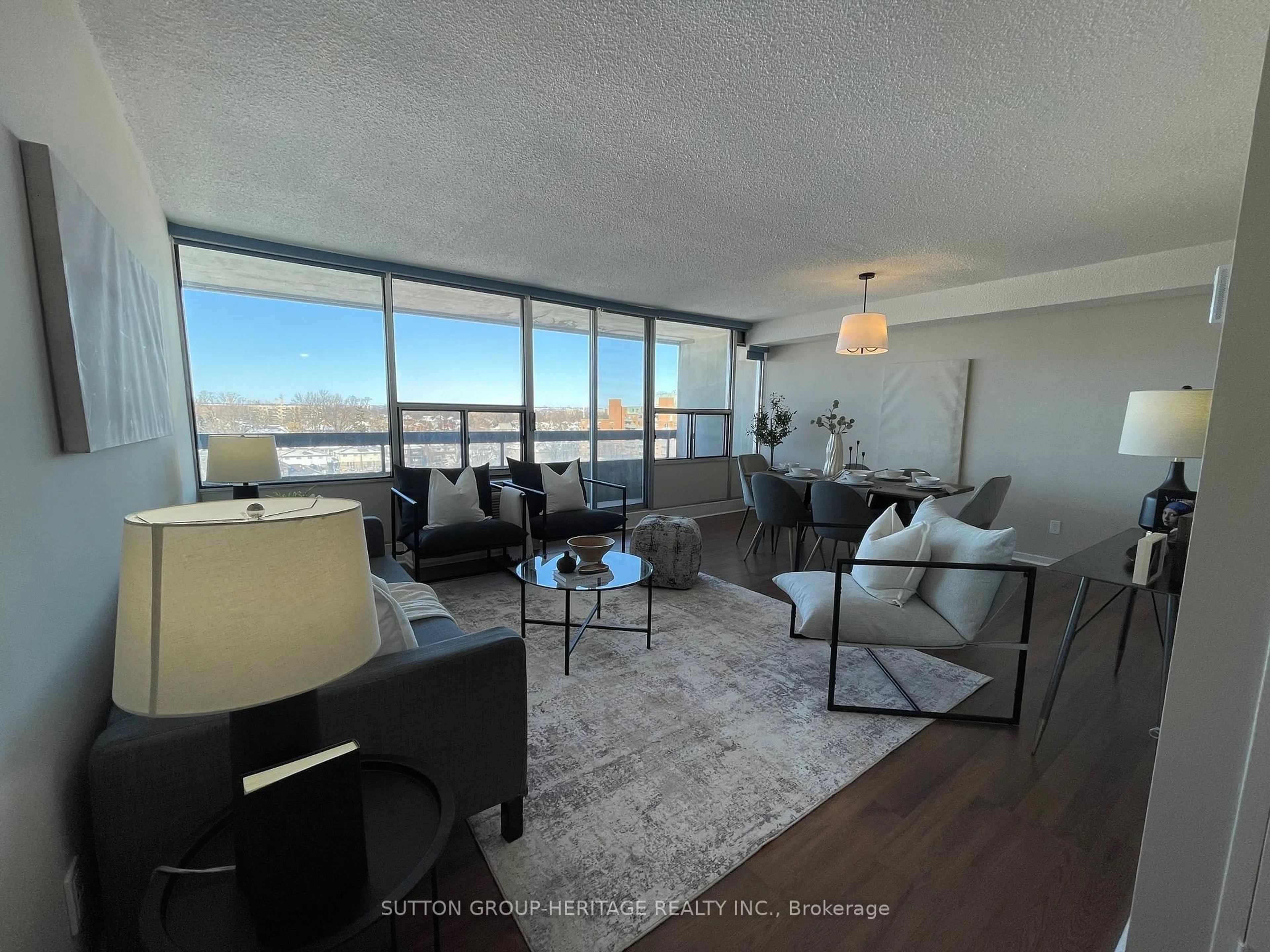 Living room with furniture, unknown for 55 William St #912, Oshawa Ontario L1G 7C9