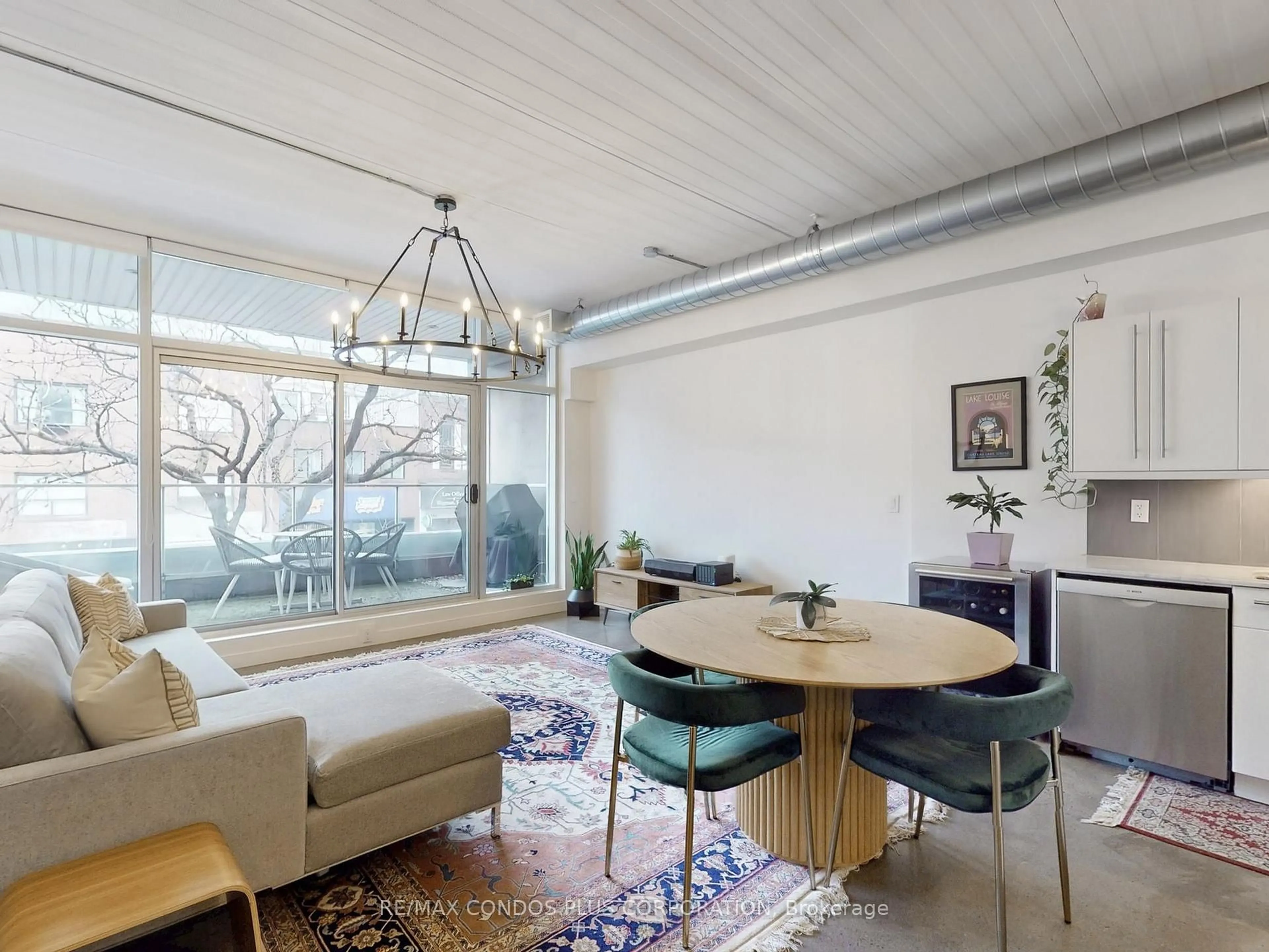 Living room with furniture, unknown for 747 Queen St #201, Toronto Ontario M4M 1H3